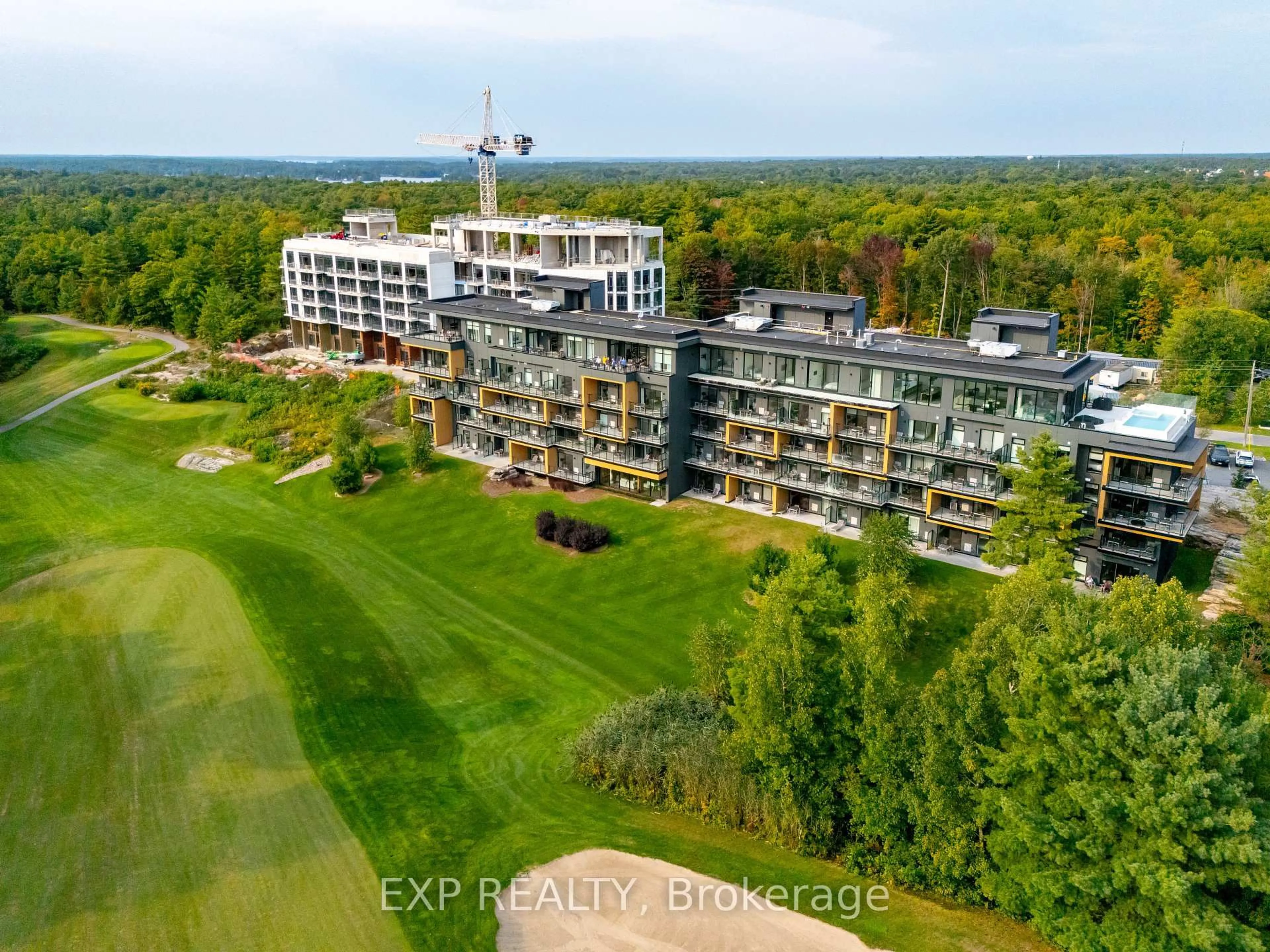 A pic from outside/outdoor area/front of a property/back of a property/a pic from drone, unknown for 120 Carrick Tr #102, Gravenhurst Ontario P1P 0B6