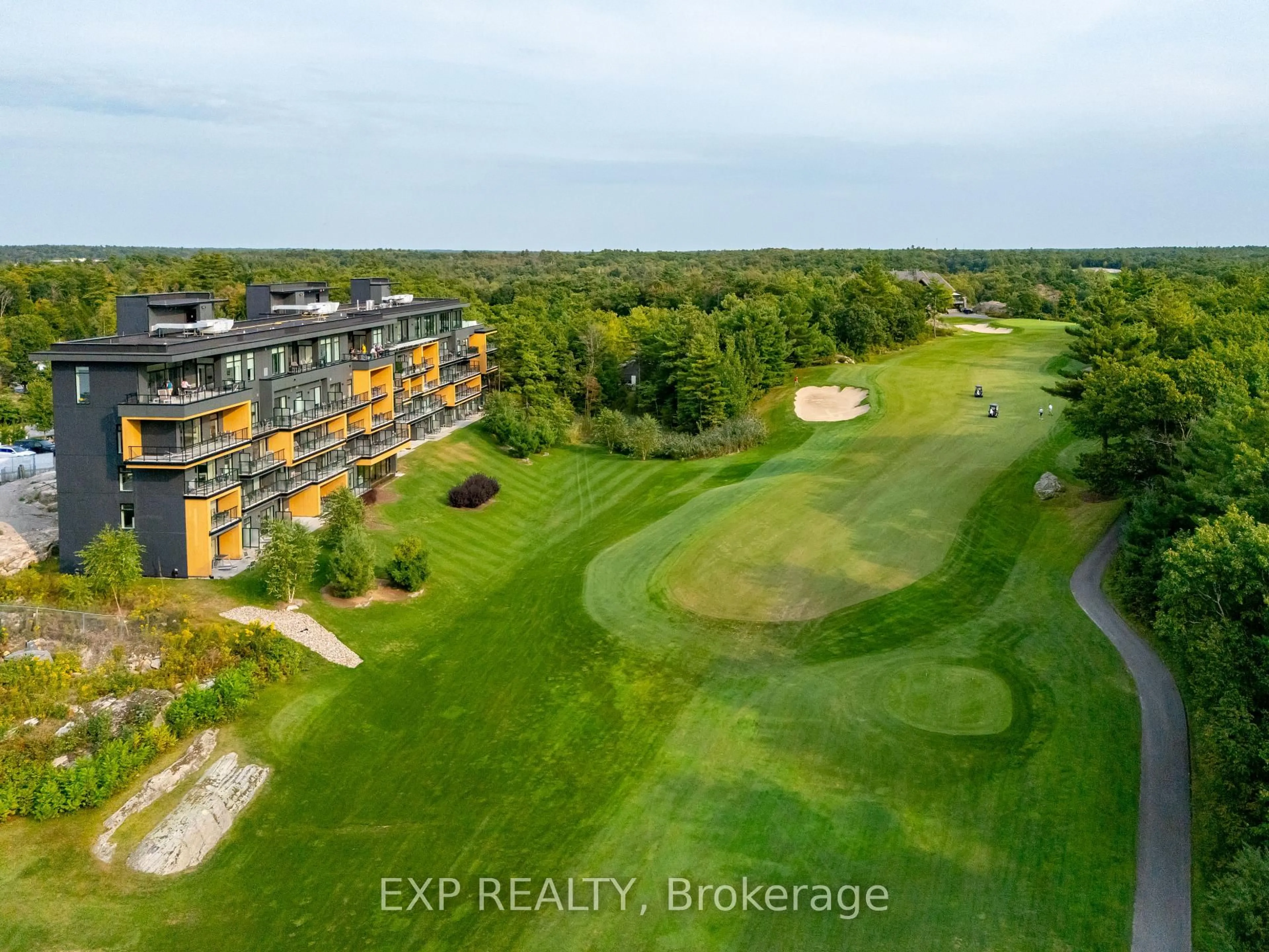 A pic from outside/outdoor area/front of a property/back of a property/a pic from drone, water/lake/river/ocean view for 120 Carrick Tr #102, Gravenhurst Ontario P1P 0B6