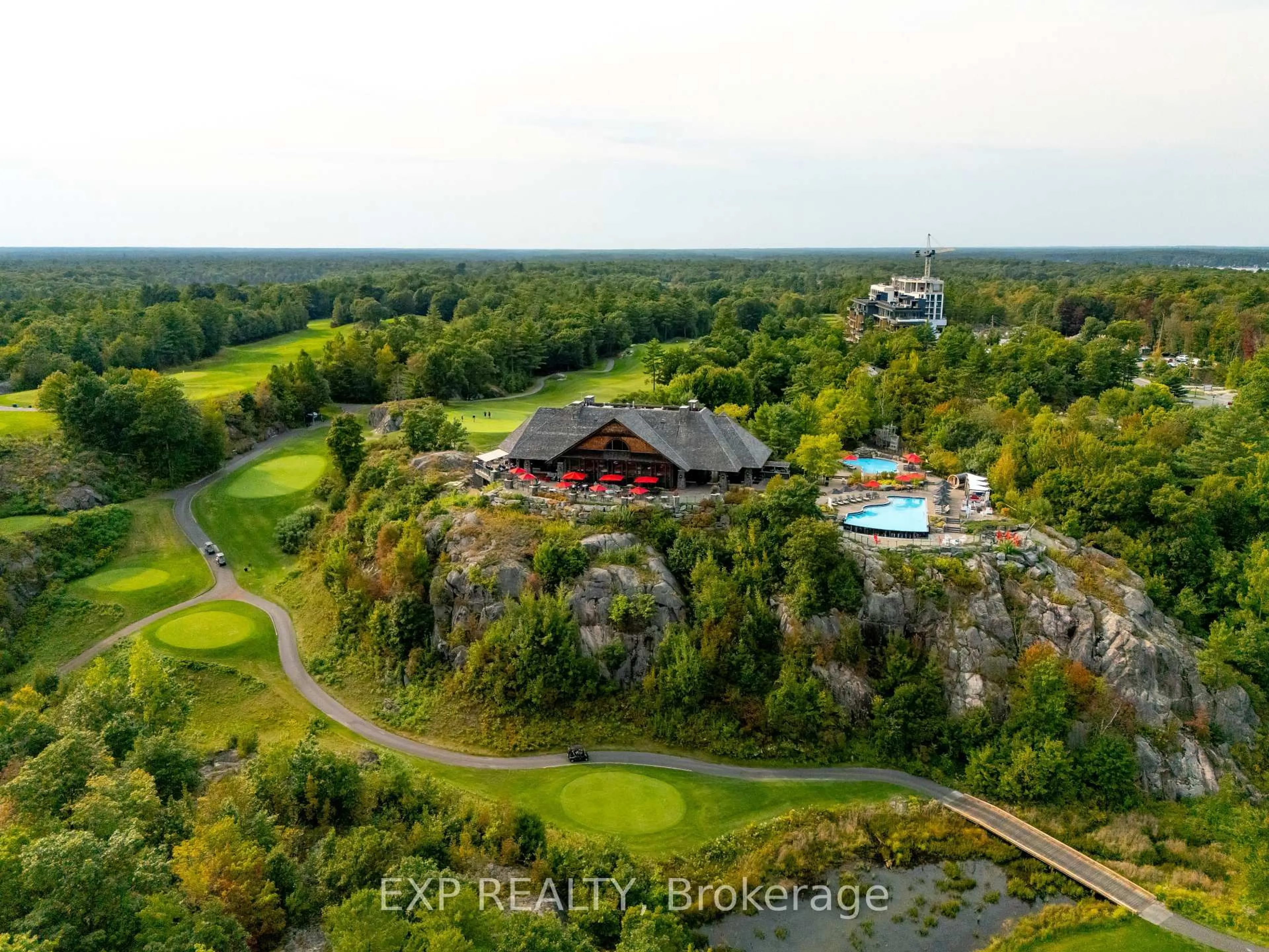A pic from outside/outdoor area/front of a property/back of a property/a pic from drone, unknown for 120 Carrick Tr #102, Gravenhurst Ontario P1P 0B6