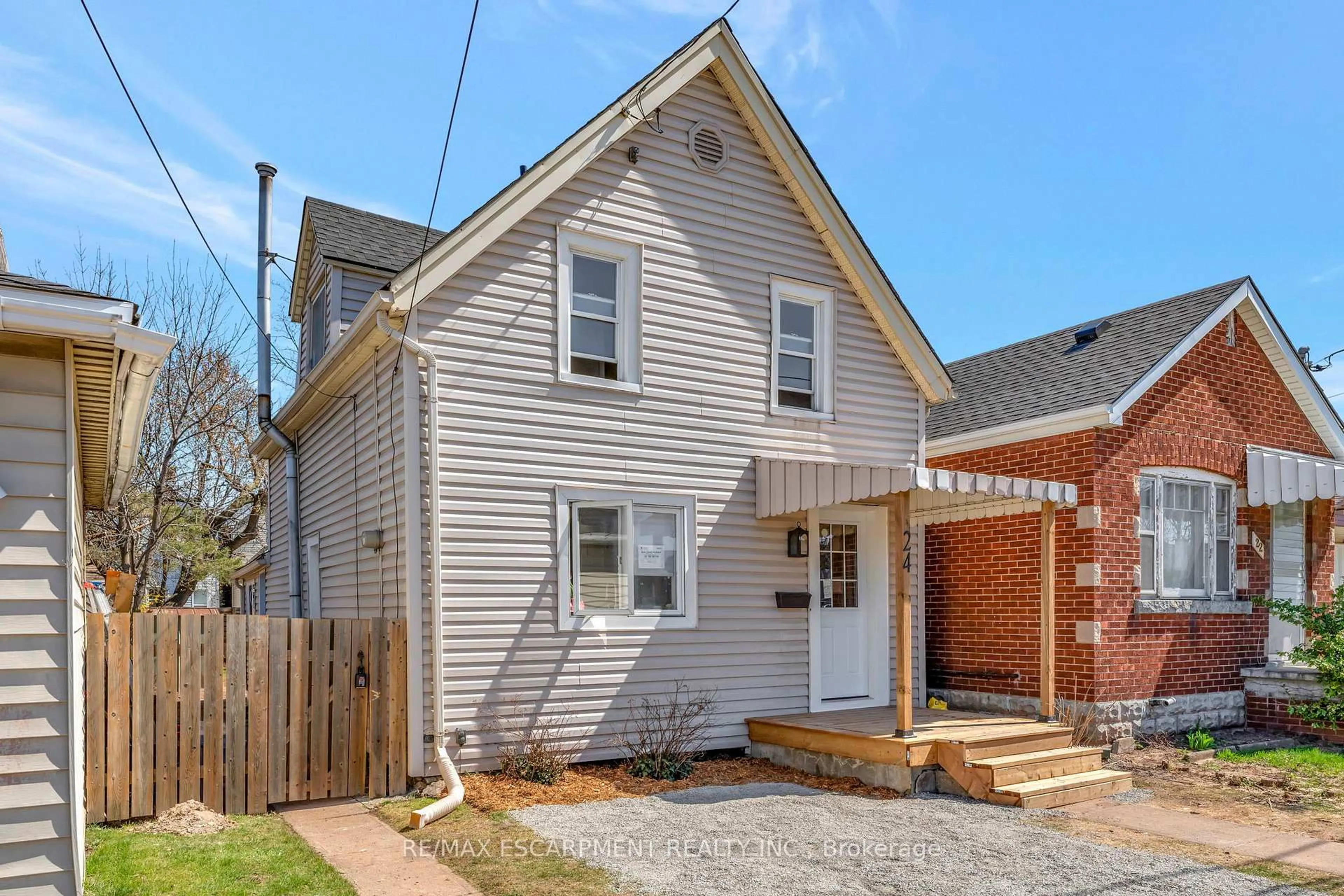 Home with brick exterior material, street for 24 Carlisle St, Hamilton Ontario L8H 4C3