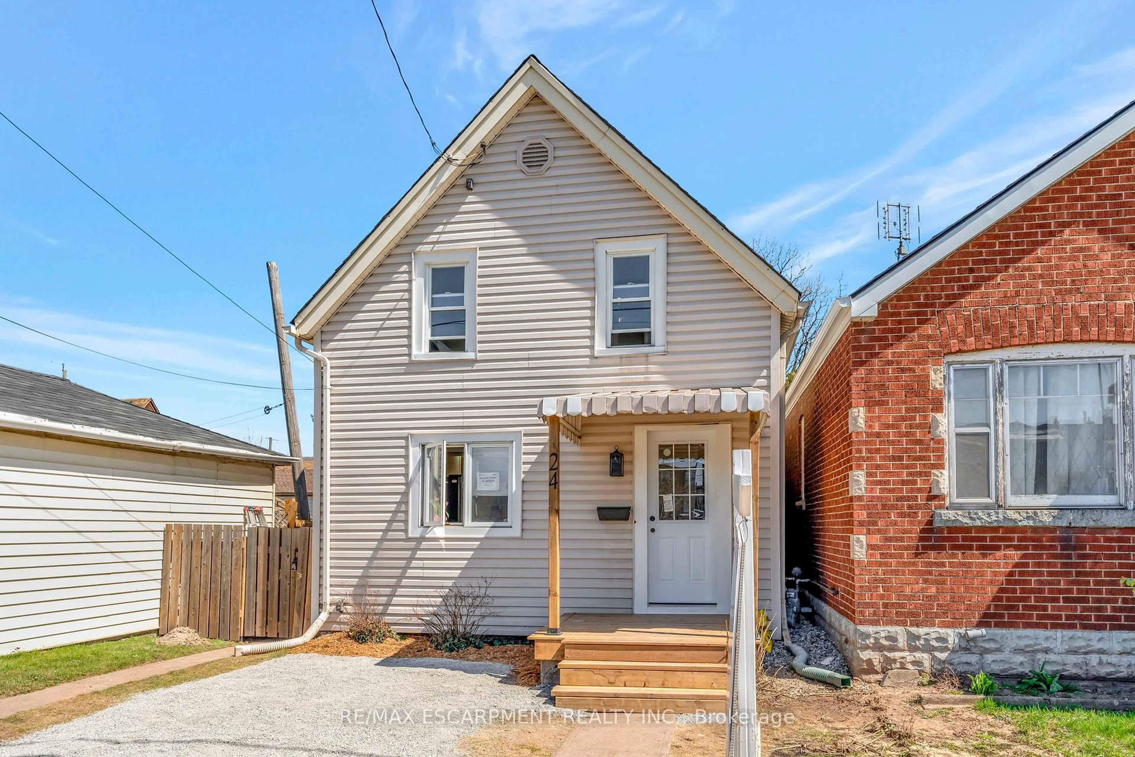 Home with brick exterior material, street for 24 Carlisle St, Hamilton Ontario L8H 4C3