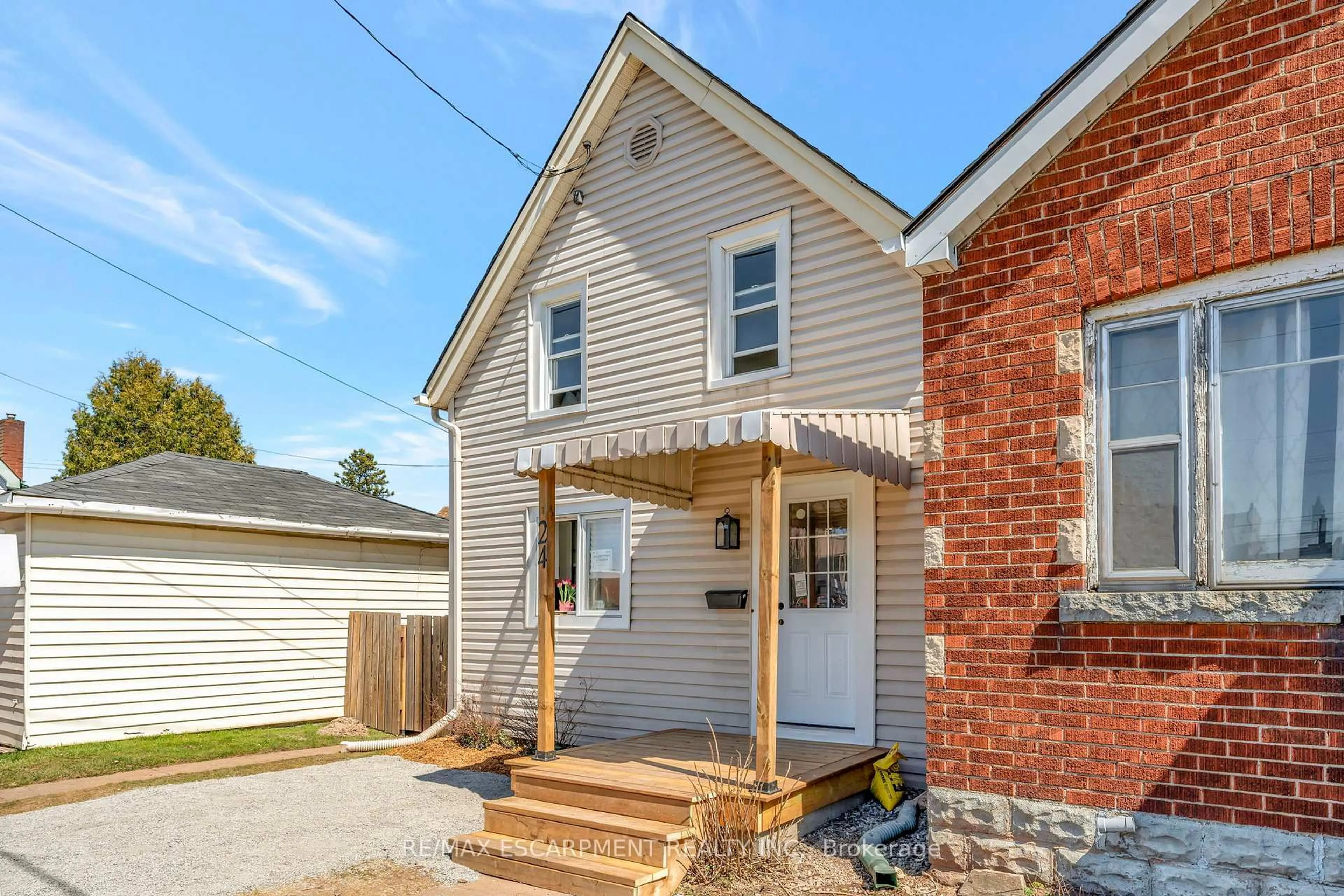 Home with brick exterior material, street for 24 Carlisle St, Hamilton Ontario L8H 4C3
