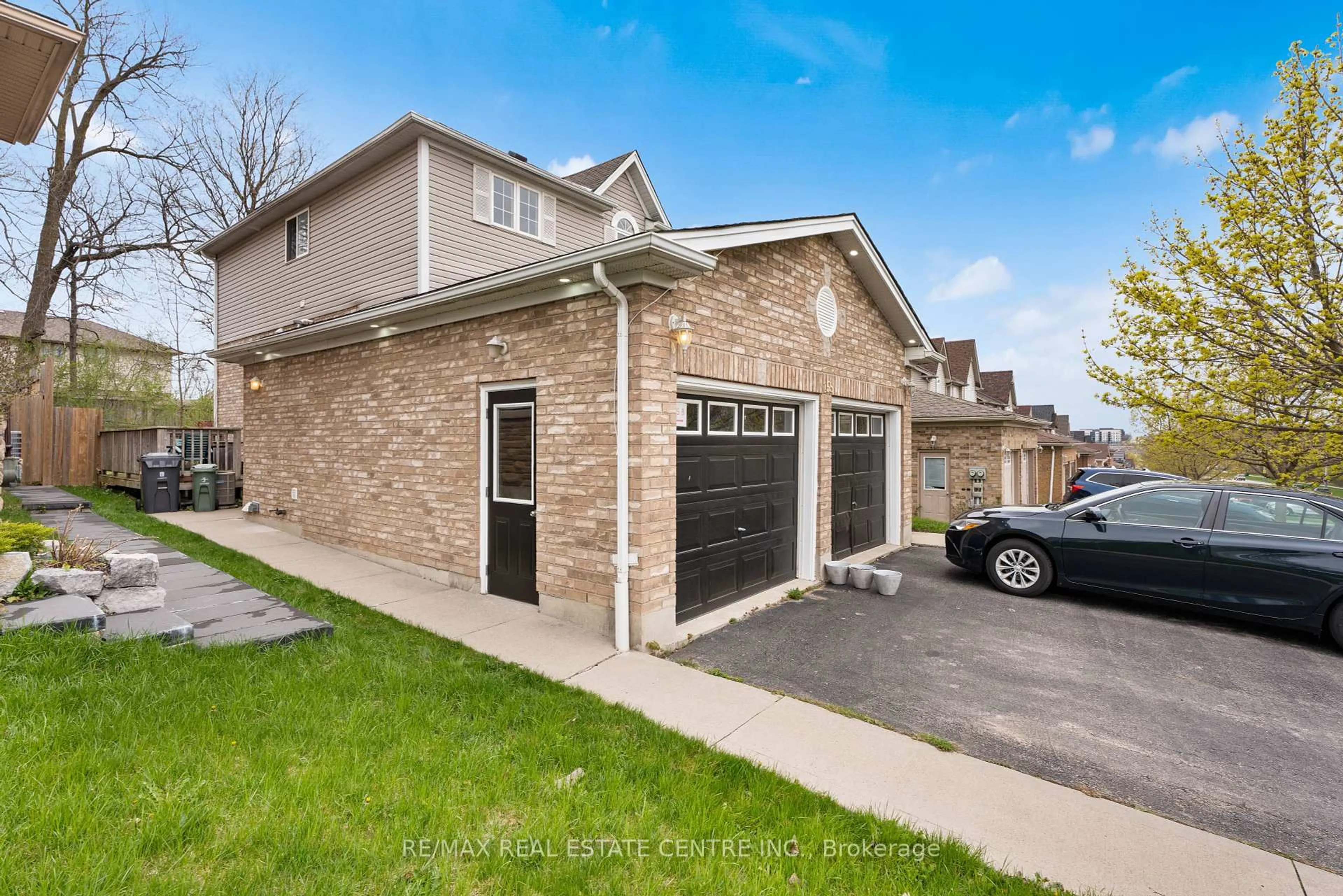Home with brick exterior material, street for 155 Elmira Rd, Guelph Ontario N1K 1Y9