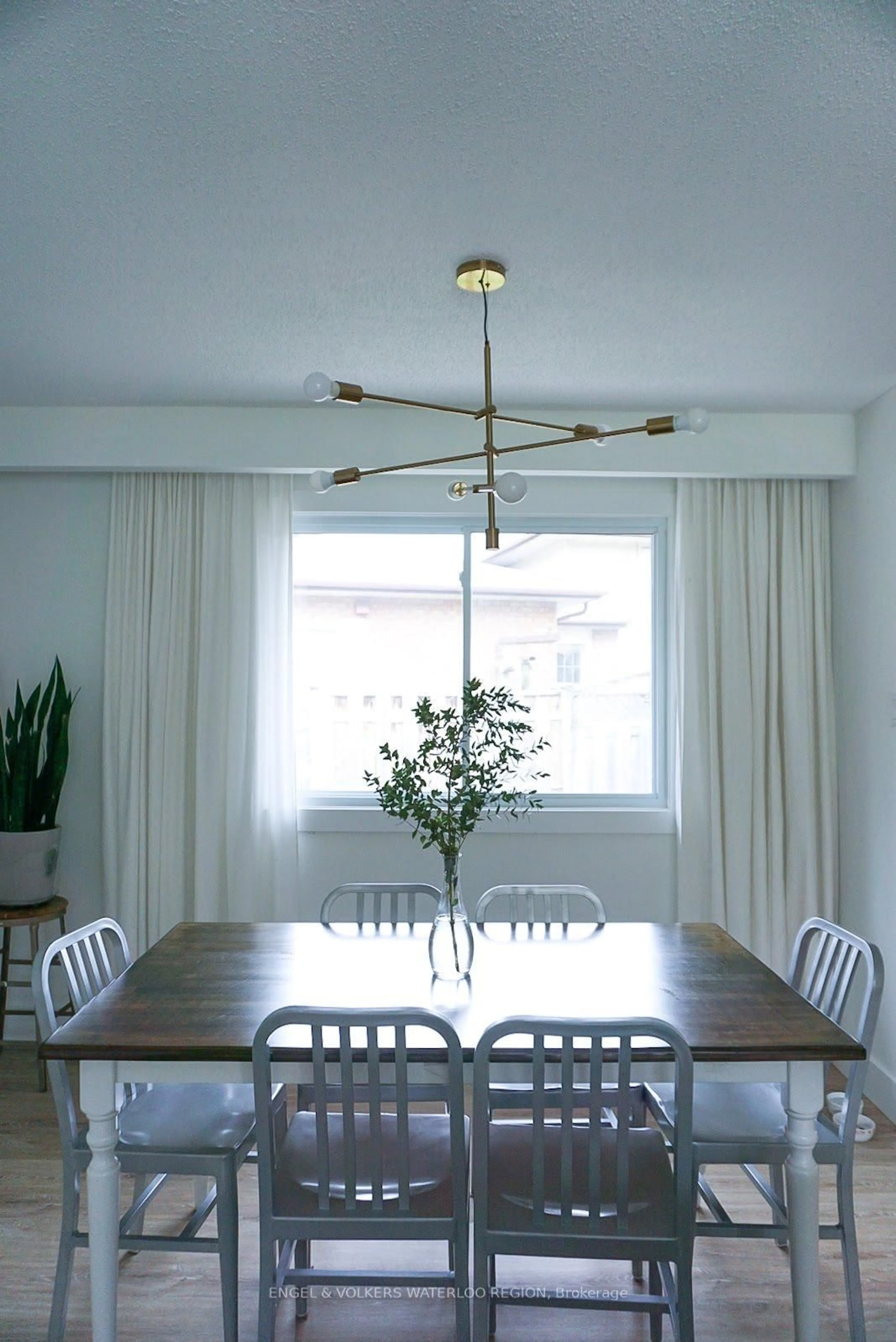 Dining room, wood/laminate floor for 113 Martinglen Cres, Kitchener Ontario N2E 2A3