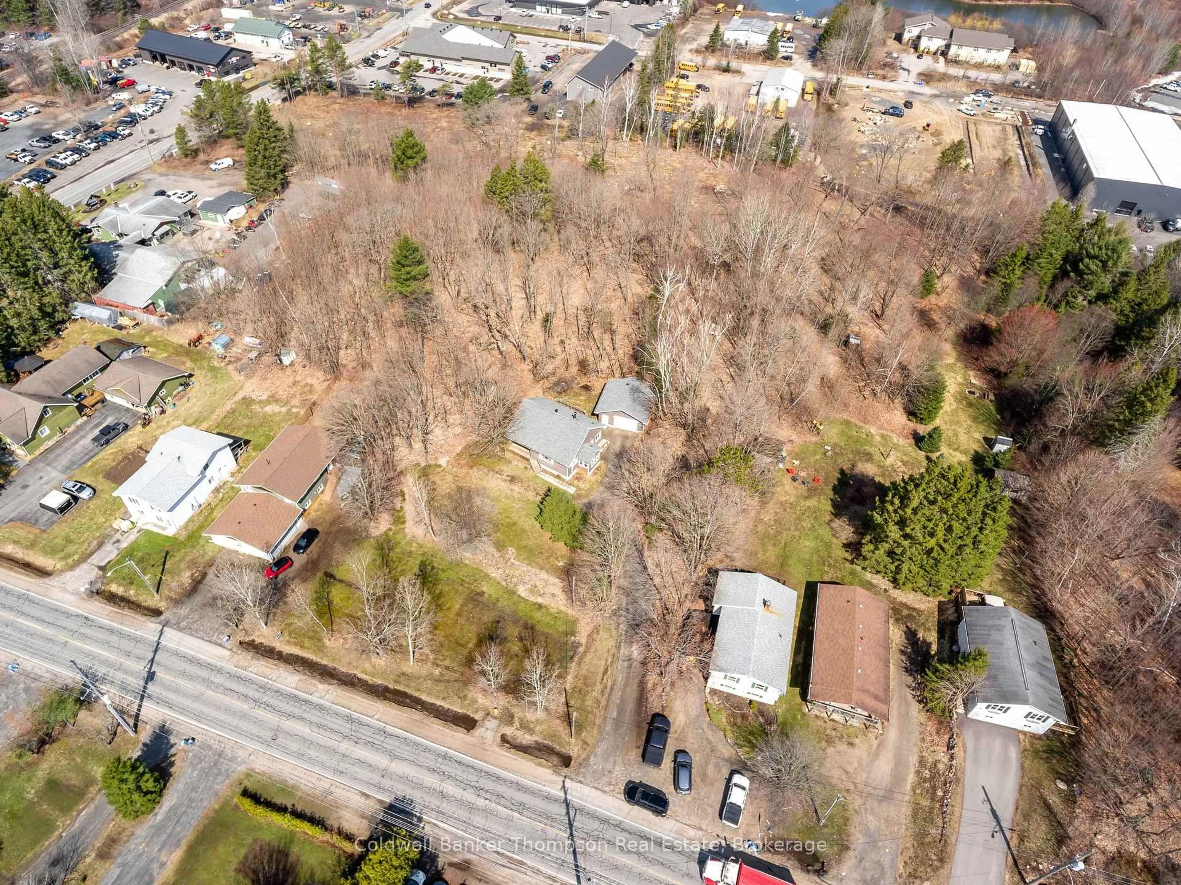 A pic from outside/outdoor area/front of a property/back of a property/a pic from drone, street for 66 Hanes Rd, Huntsville Ontario P1H 1M3
