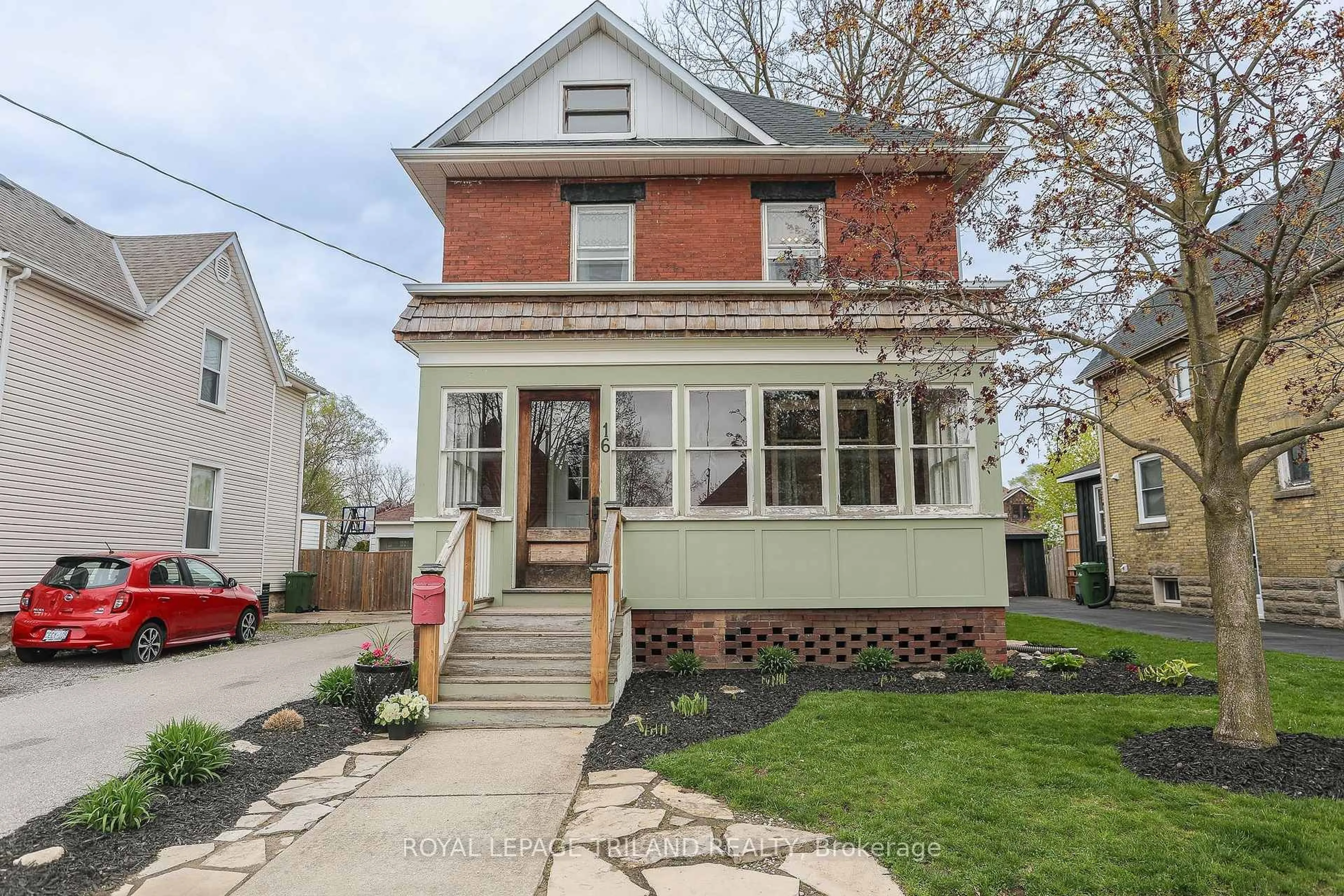 Home with brick exterior material, street for 16 Maple St, St. Thomas Ontario N5R 1Y9