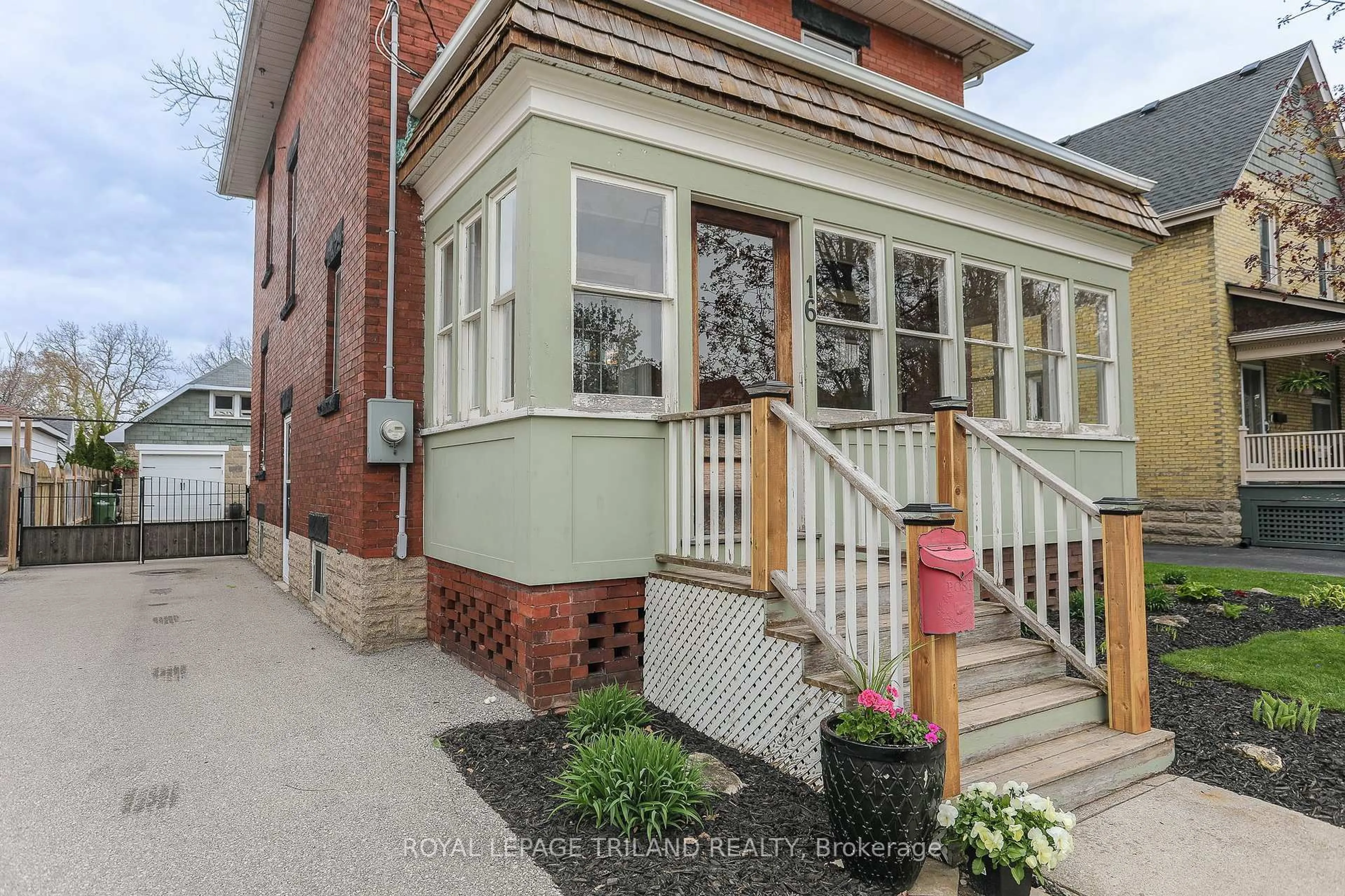 Home with brick exterior material, street for 16 Maple St, St. Thomas Ontario N5R 1Y9