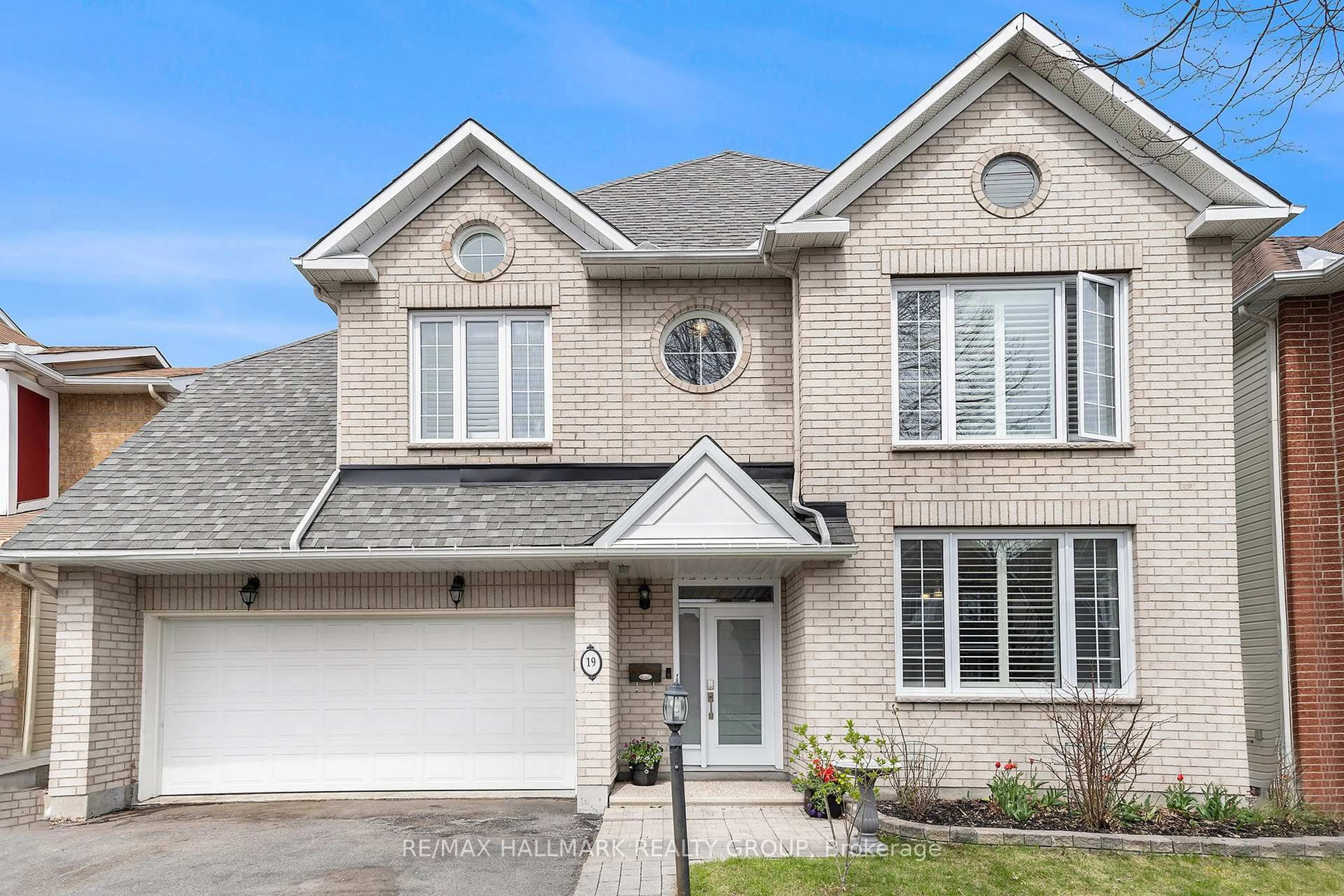 Home with brick exterior material, street for 19 Westwinds Pl, Barrhaven Ontario K2G 6L1