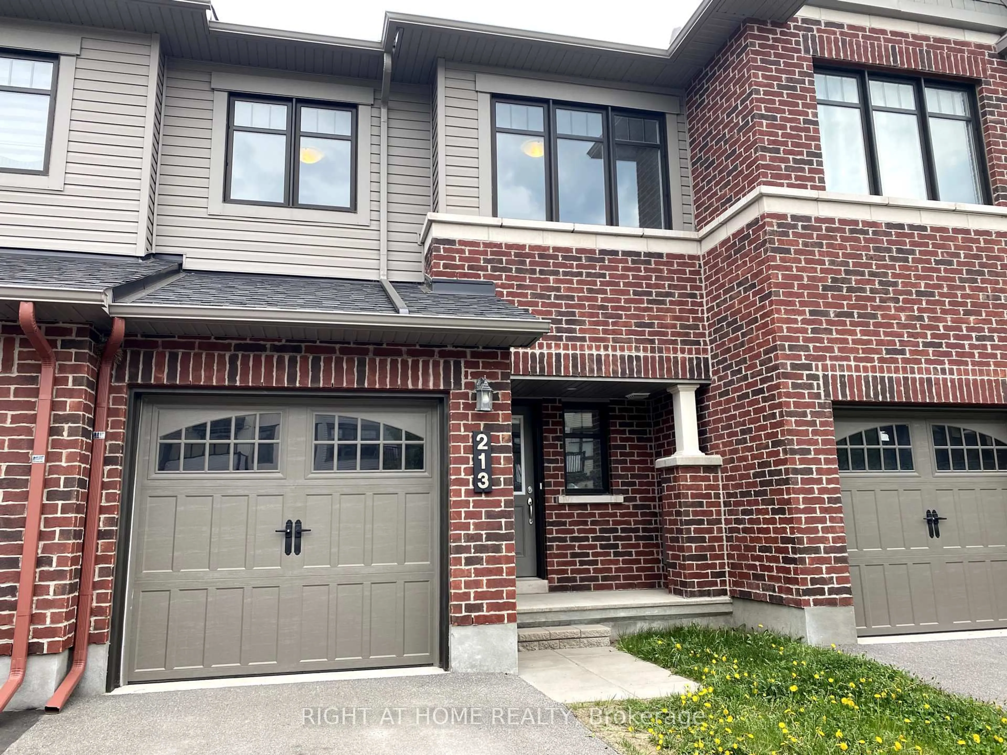 Home with brick exterior material, street for 213 HALYARD Way, Ottawa Ontario K2T 0L2