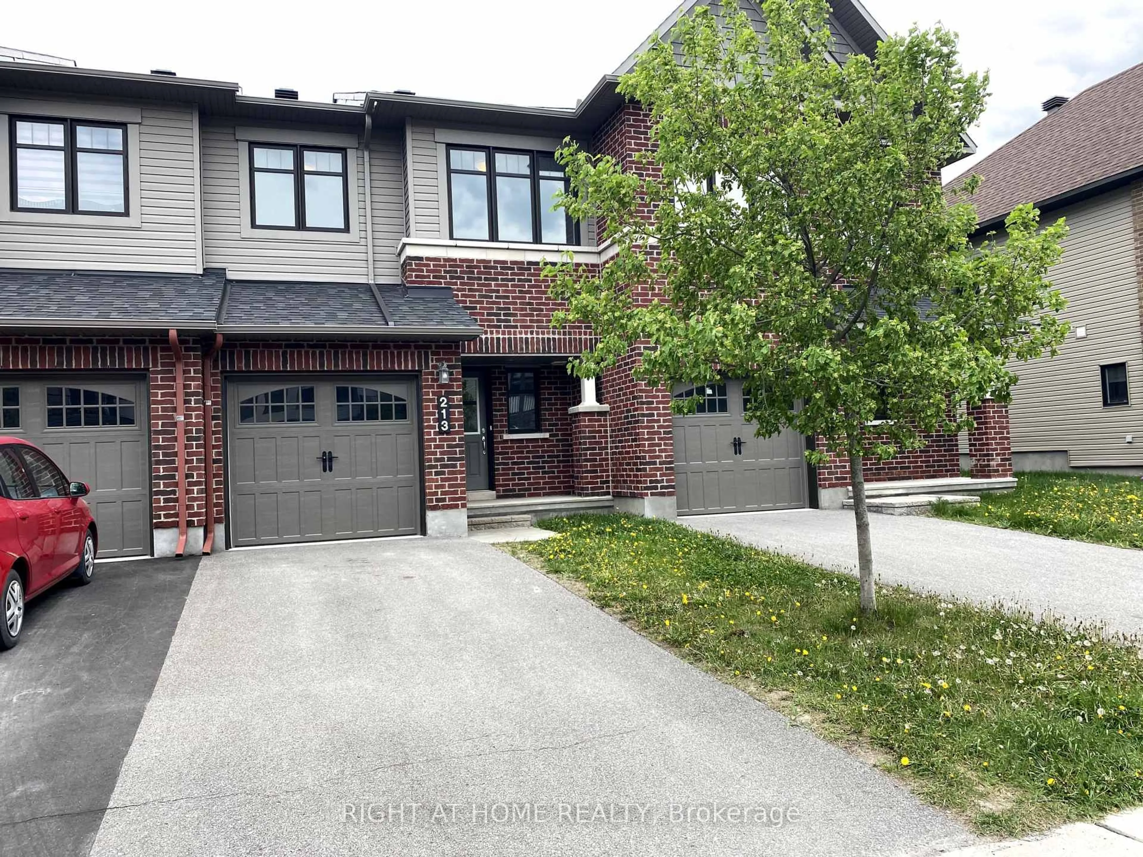 Home with brick exterior material, street for 213 HALYARD Way, Ottawa Ontario K2T 0L2