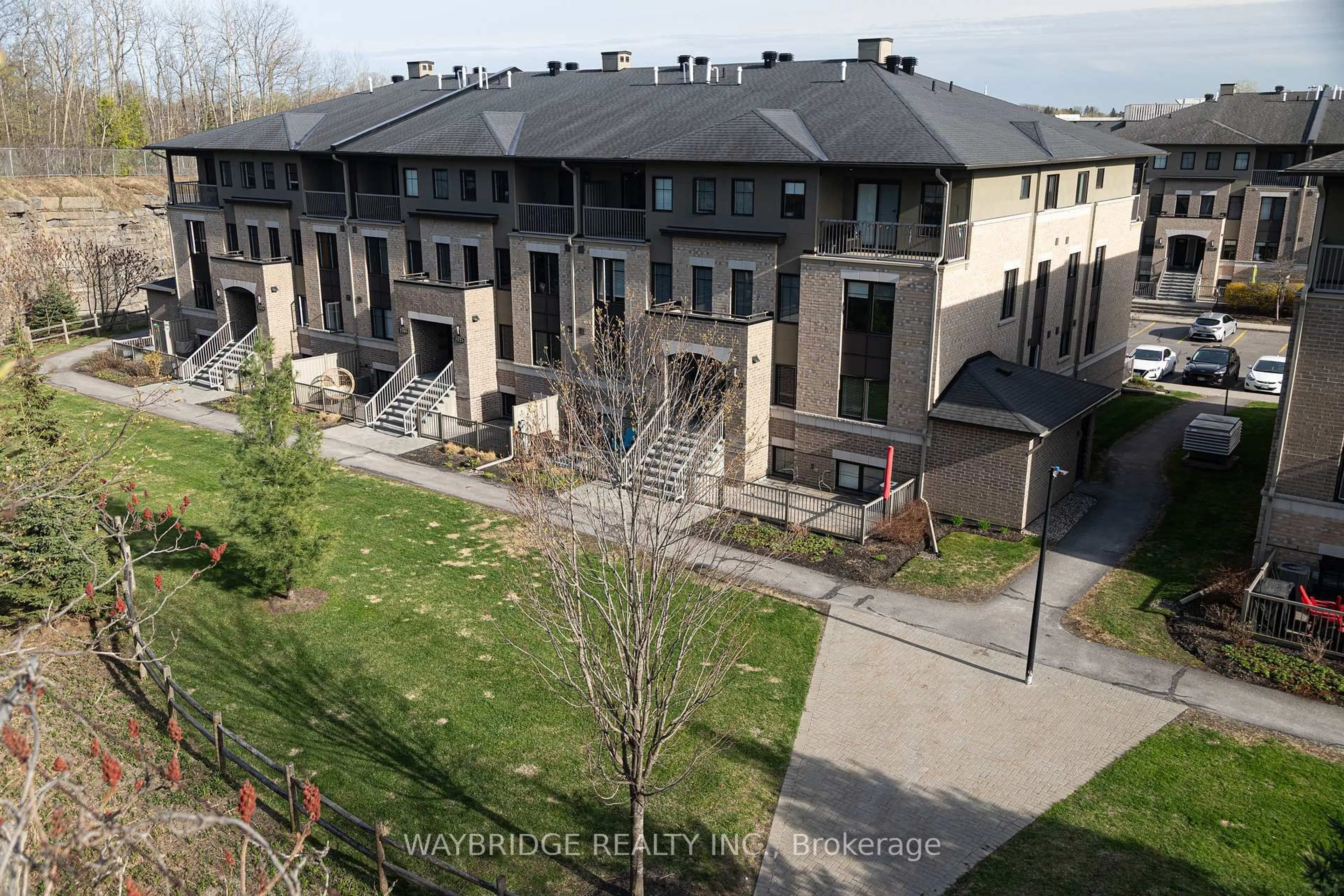 A pic from outside/outdoor area/front of a property/back of a property/a pic from drone, unknown for 252B Titanium Private, Ottawa Ontario K1C 0A5