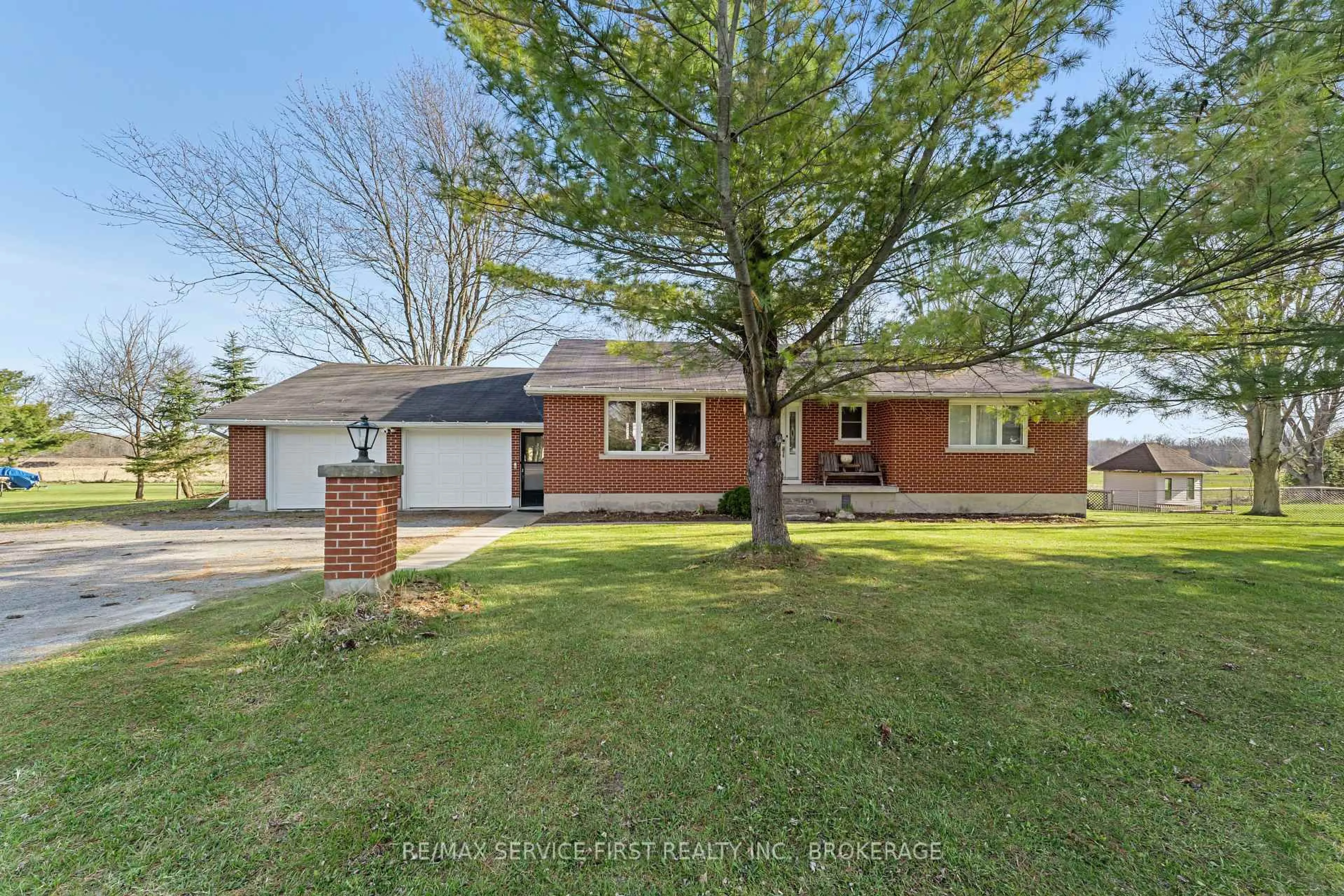 Home with brick exterior material, street for 7050 County Road 2 Rd, Loyalist Ontario K7K 1Z2
