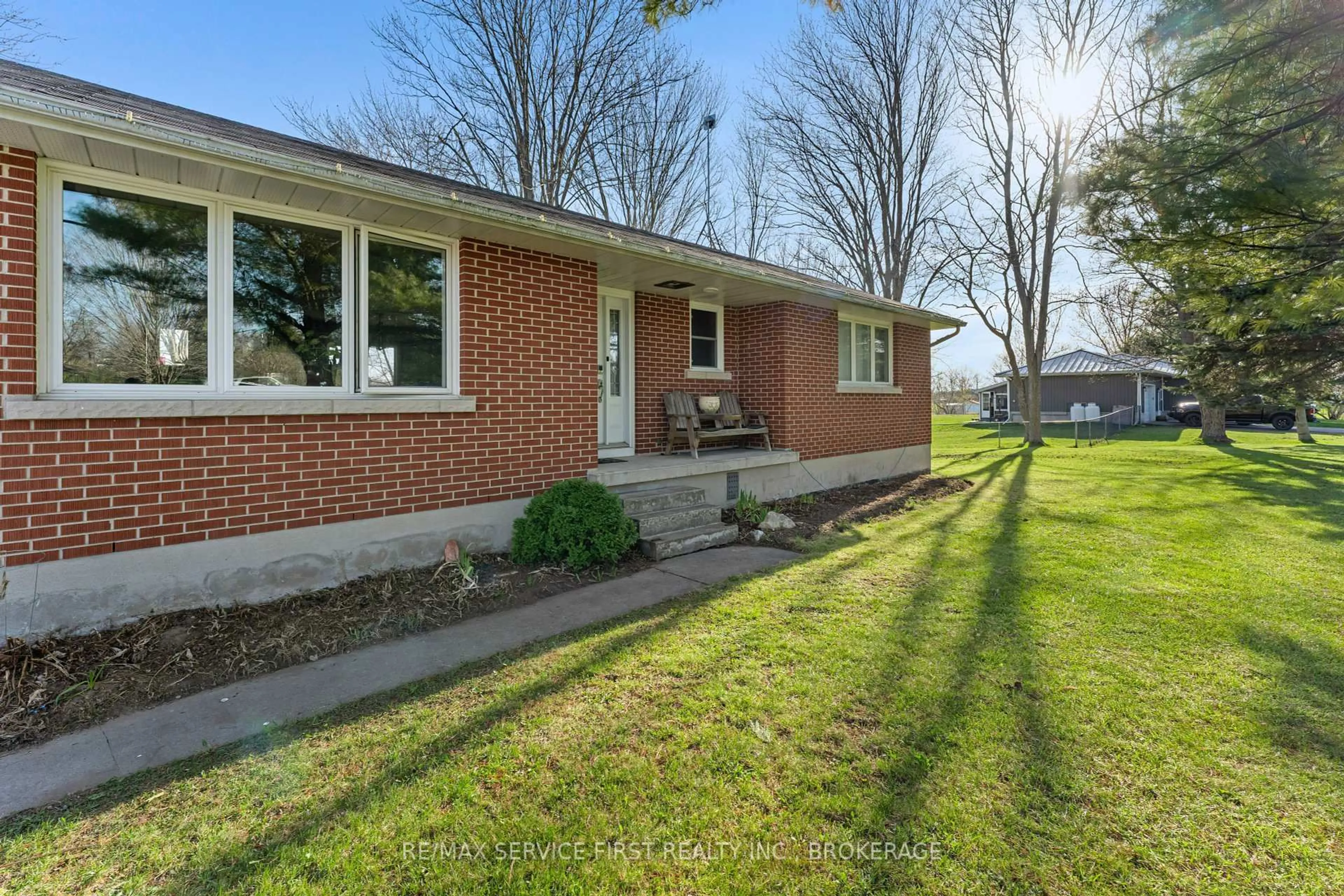 Home with brick exterior material, unknown for 7050 County Road 2 Rd, Loyalist Ontario K7K 1Z2