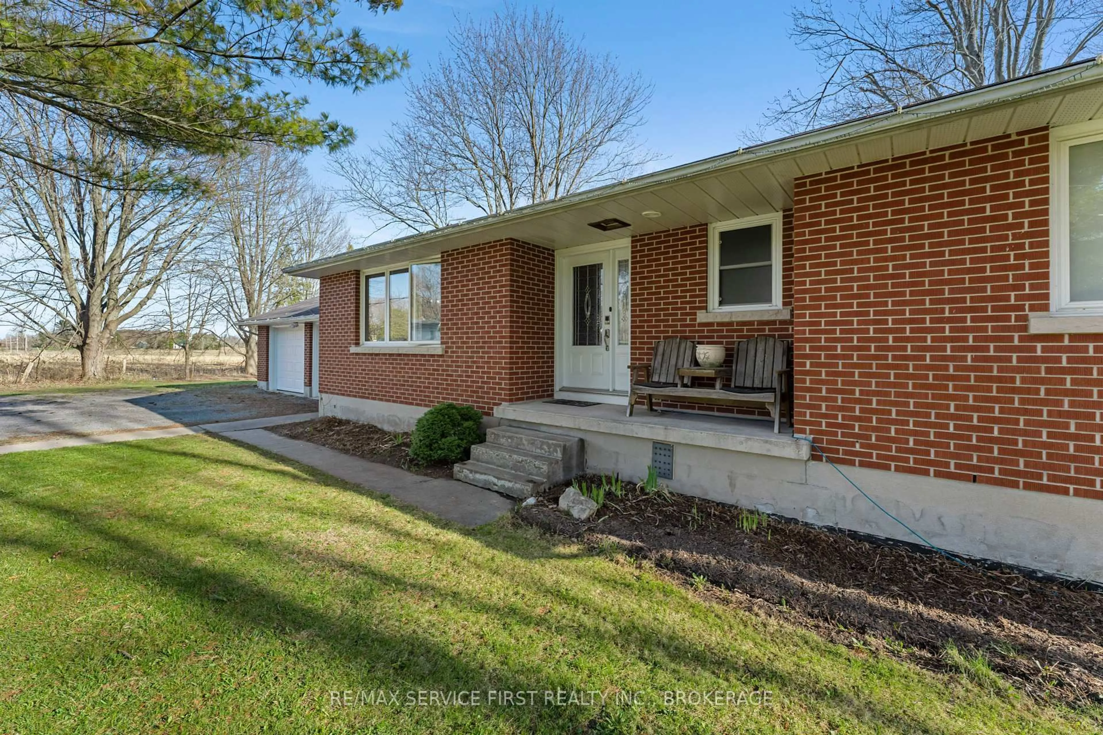 Home with brick exterior material, street for 7050 County Road 2 Rd, Loyalist Ontario K7K 1Z2