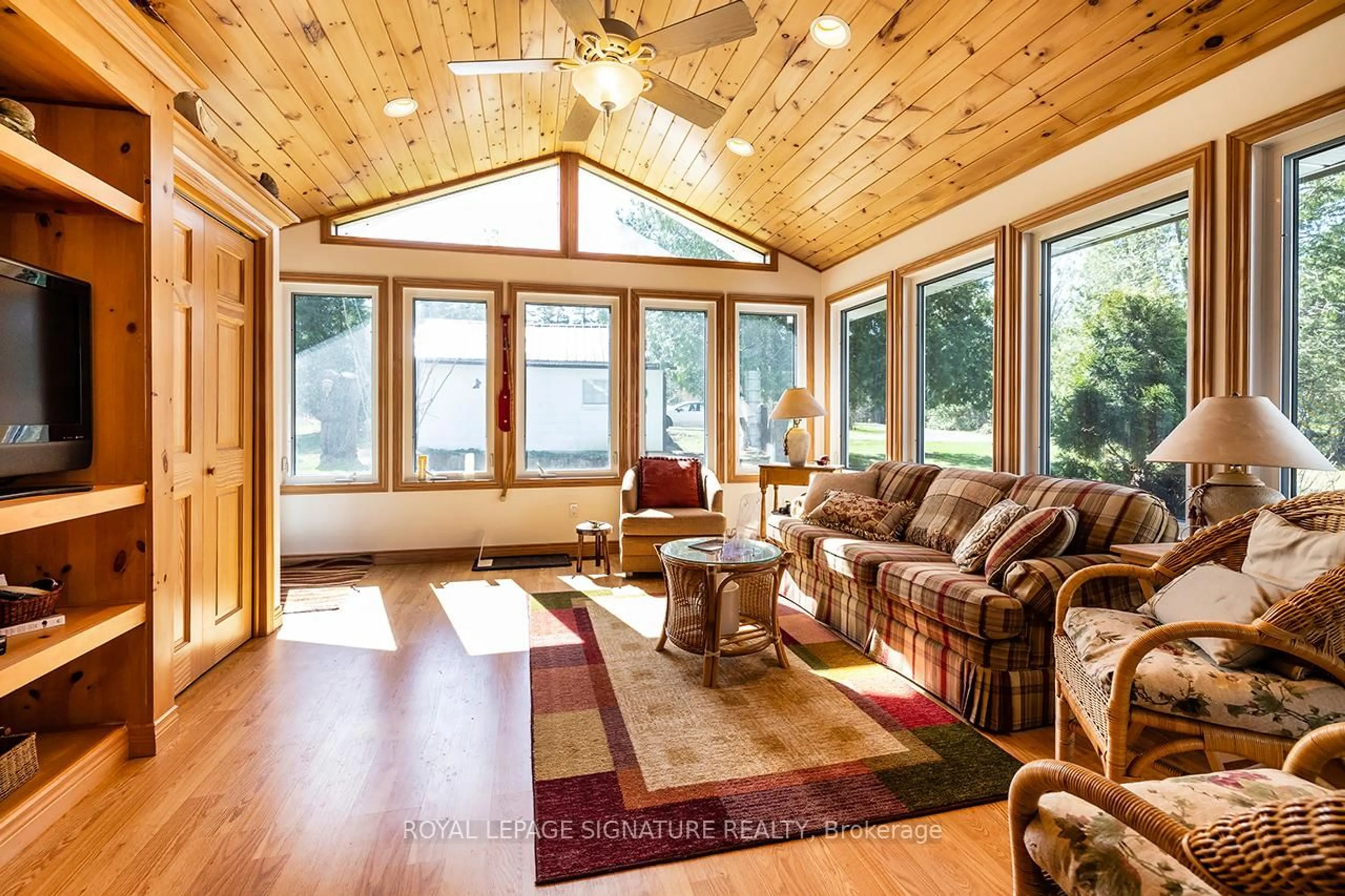 Living room with furniture, wood/laminate floor for 12 Romany Ranch Rd, Kawartha Lakes Ontario K0M 1G0