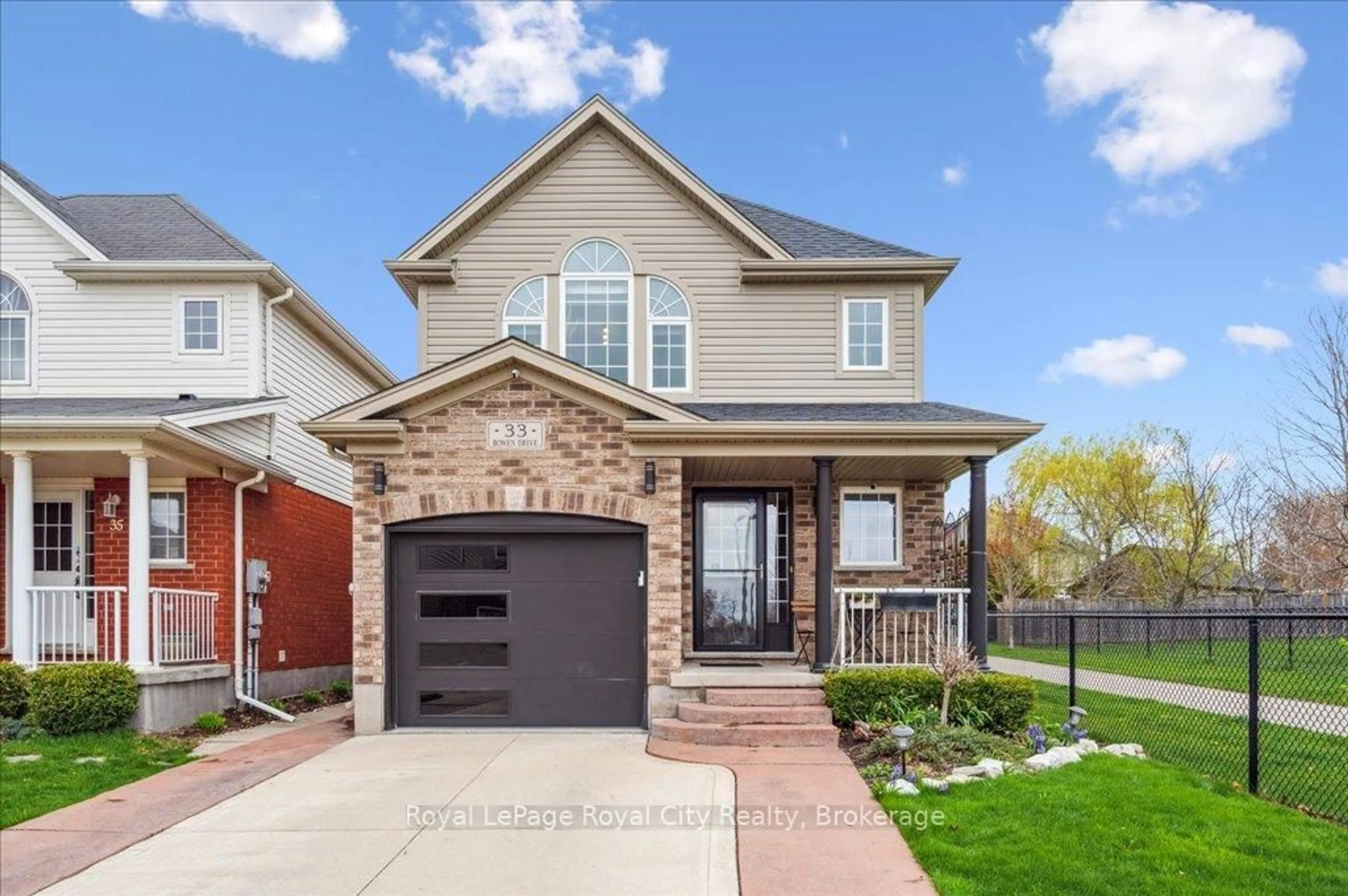 Home with brick exterior material, street for 33 Bowen Dr, Guelph Ontario N1E 0C9