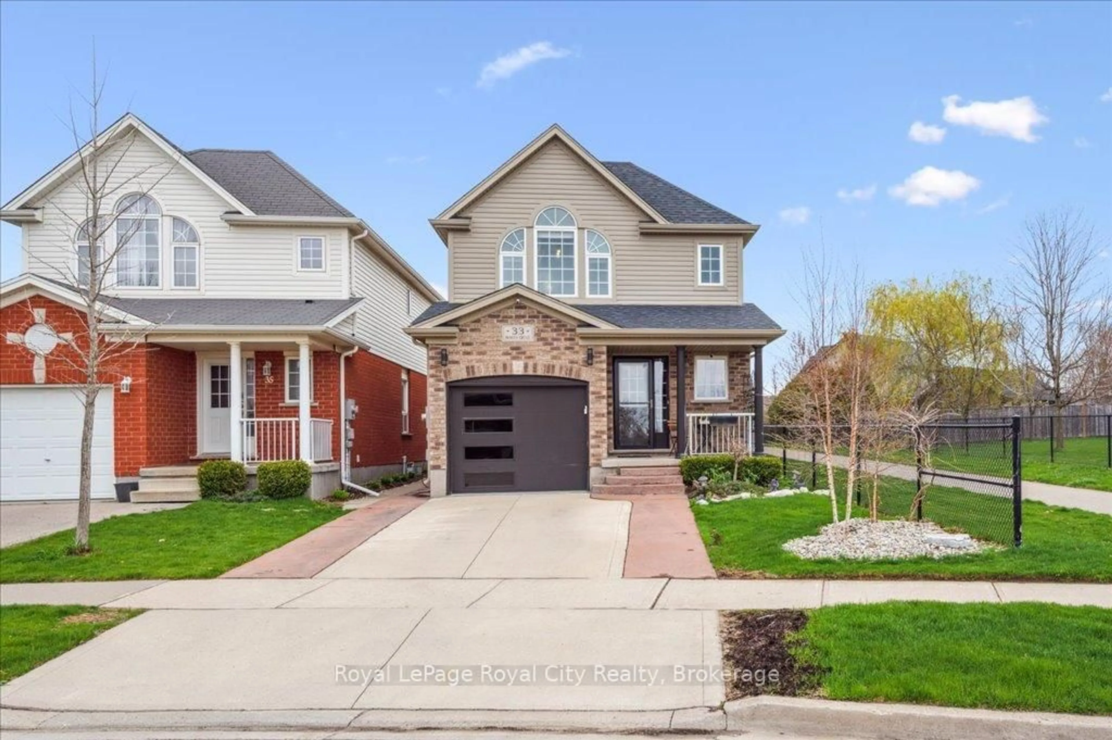 Home with brick exterior material, street for 33 Bowen Dr, Guelph Ontario N1E 0C9