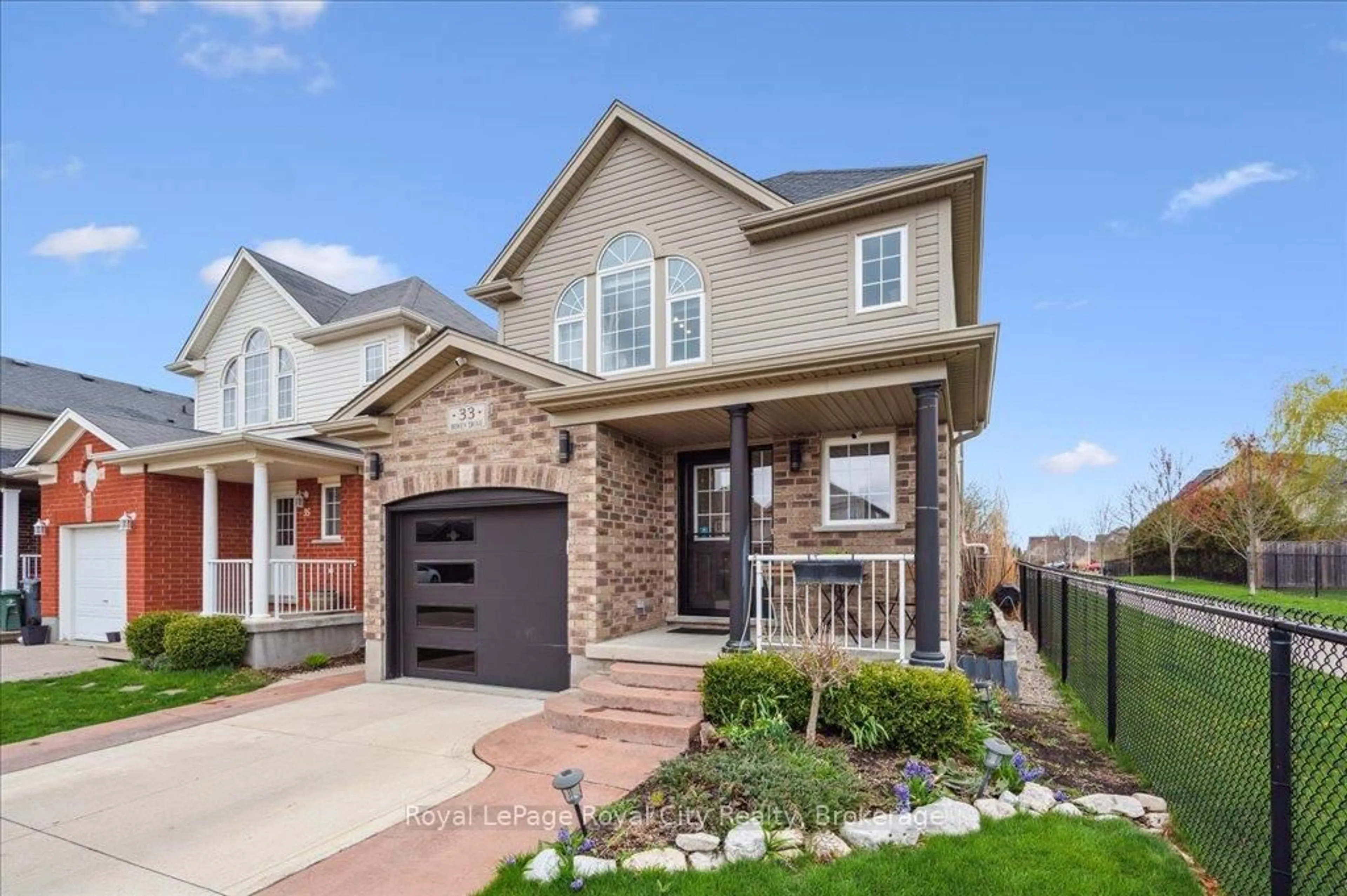 Home with brick exterior material, street for 33 Bowen Dr, Guelph Ontario N1E 0C9