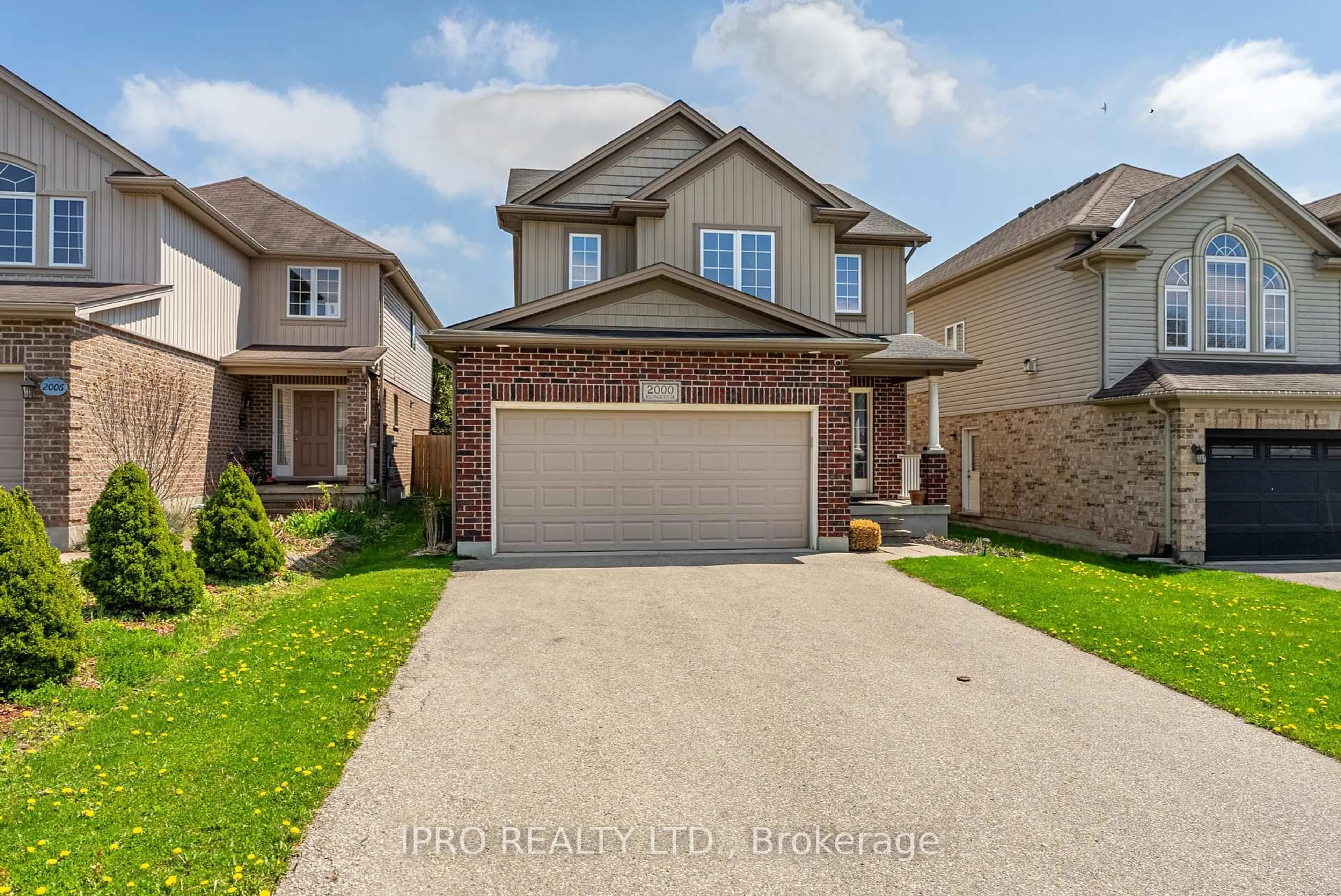 Home with brick exterior material, street for 2000 Rollingacres Dr, London North Ontario N5X 0H1