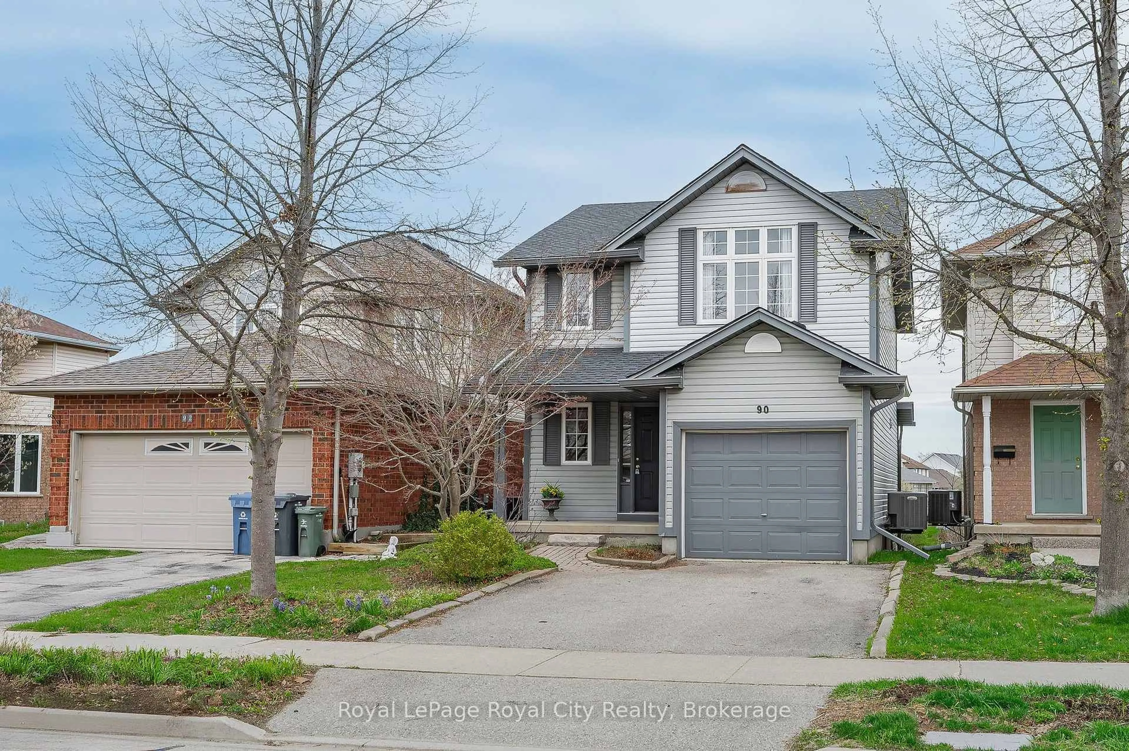 Home with brick exterior material, street for 90 Doyle Dr, Guelph Ontario N1G 5B9