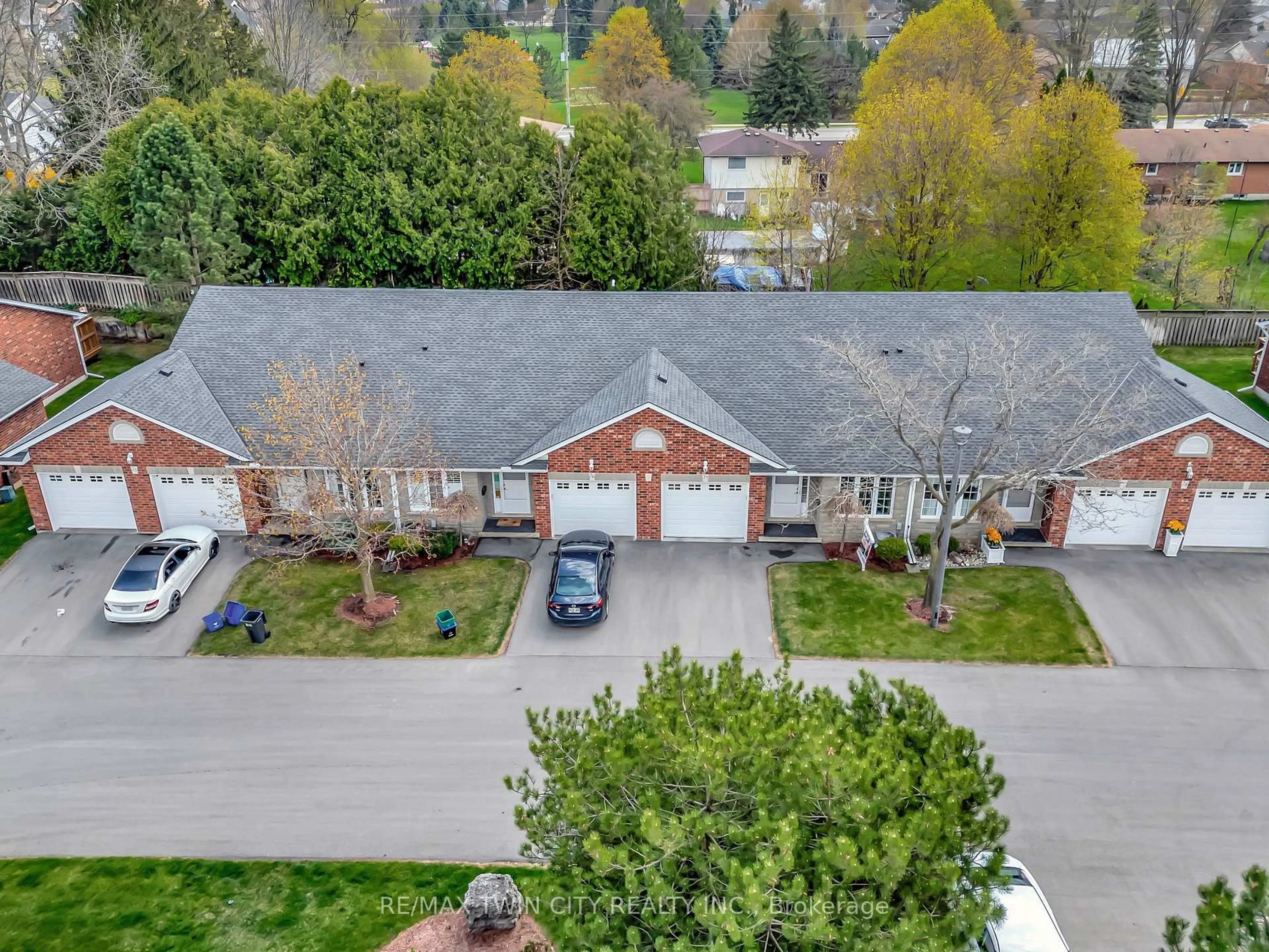 A pic from outside/outdoor area/front of a property/back of a property/a pic from drone, street for 53 Herons Landing #27, Woodstock Ontario N4T 1V2
