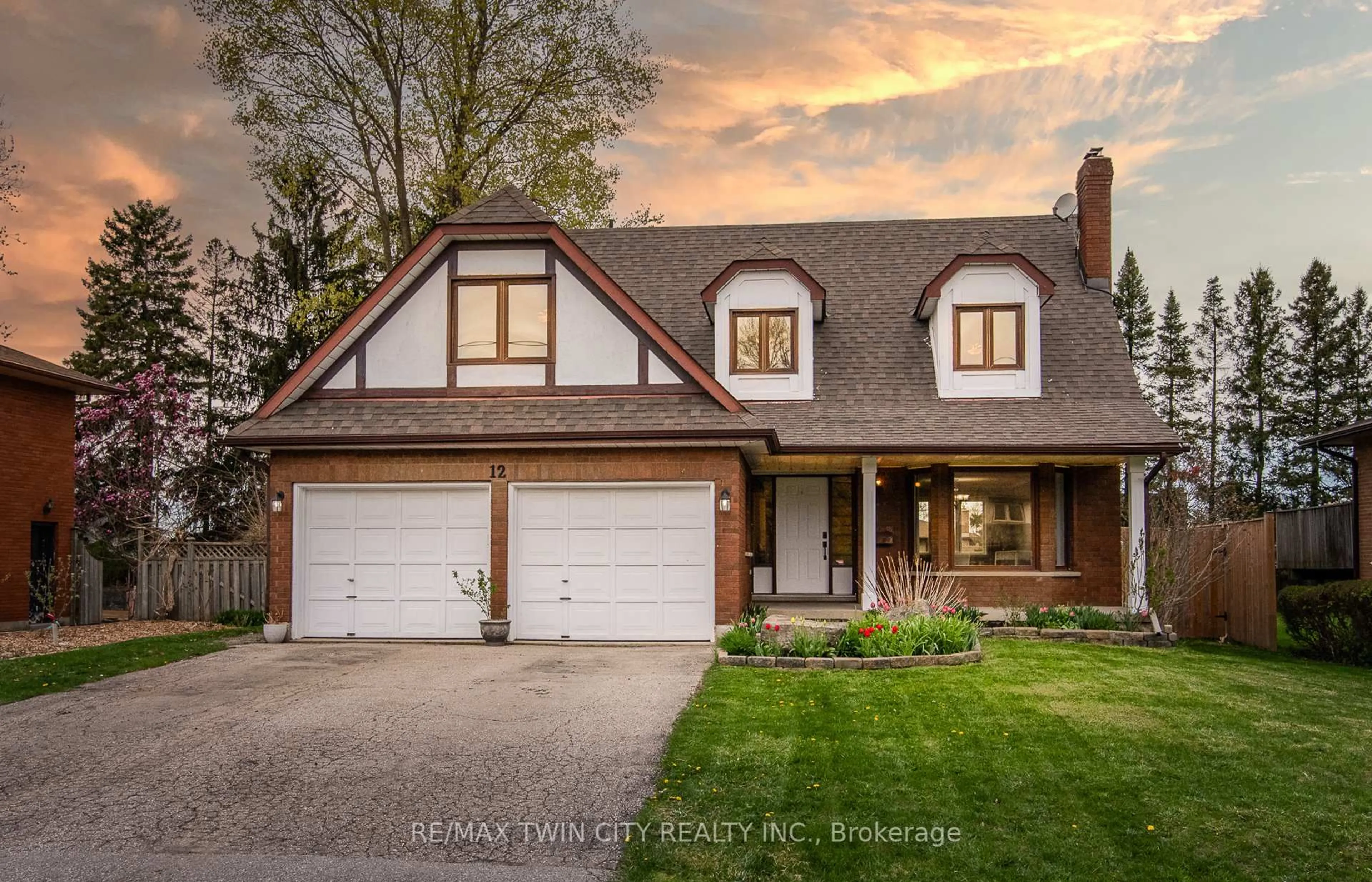Home with brick exterior material, street for 12 Sunrise Dr, Kitchener Ontario N2B 3B4