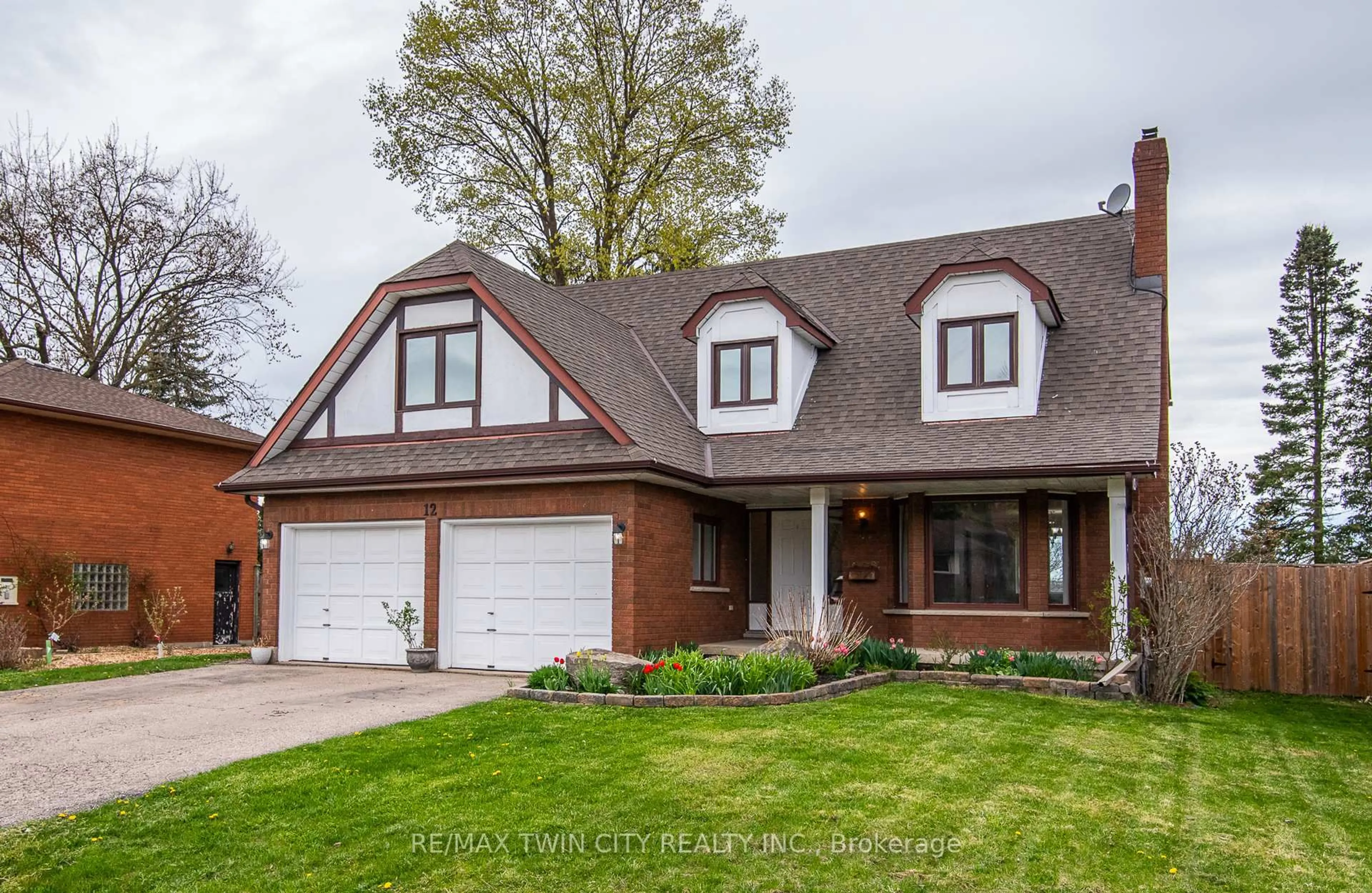 Home with brick exterior material, street for 12 Sunrise Dr, Kitchener Ontario N2B 3B4
