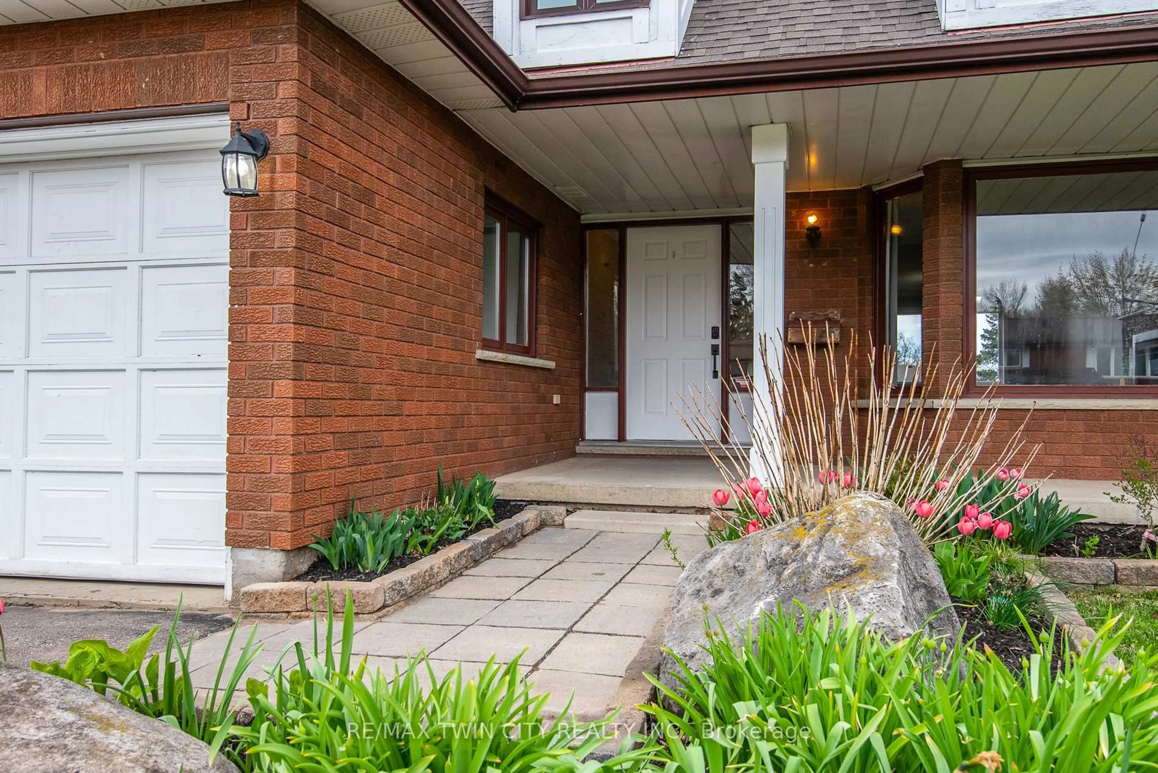 Home with brick exterior material, street for 12 Sunrise Dr, Kitchener Ontario N2B 3B4