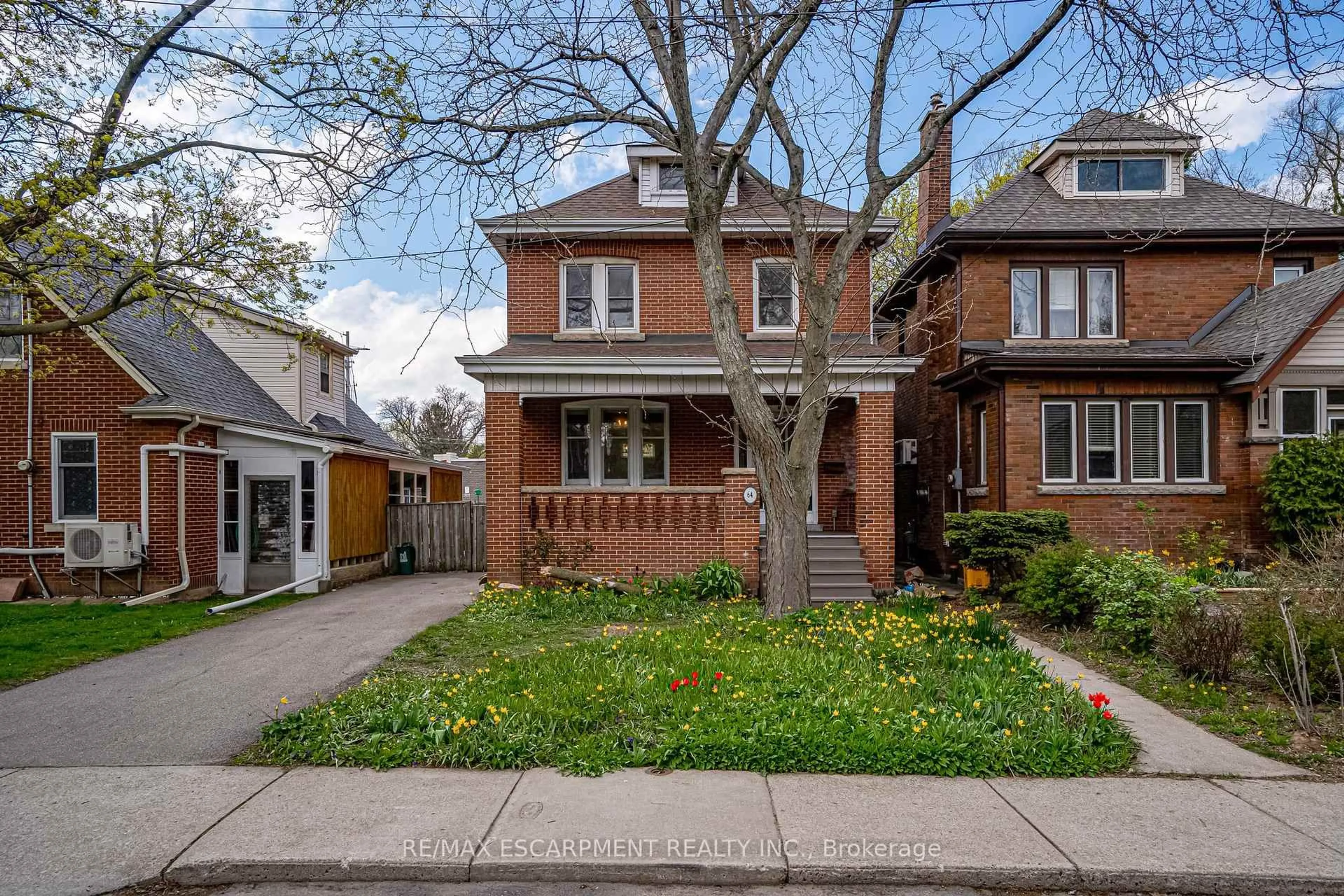 Home with brick exterior material, street for 64 South Oval St, Hamilton Ontario L8S 1P8