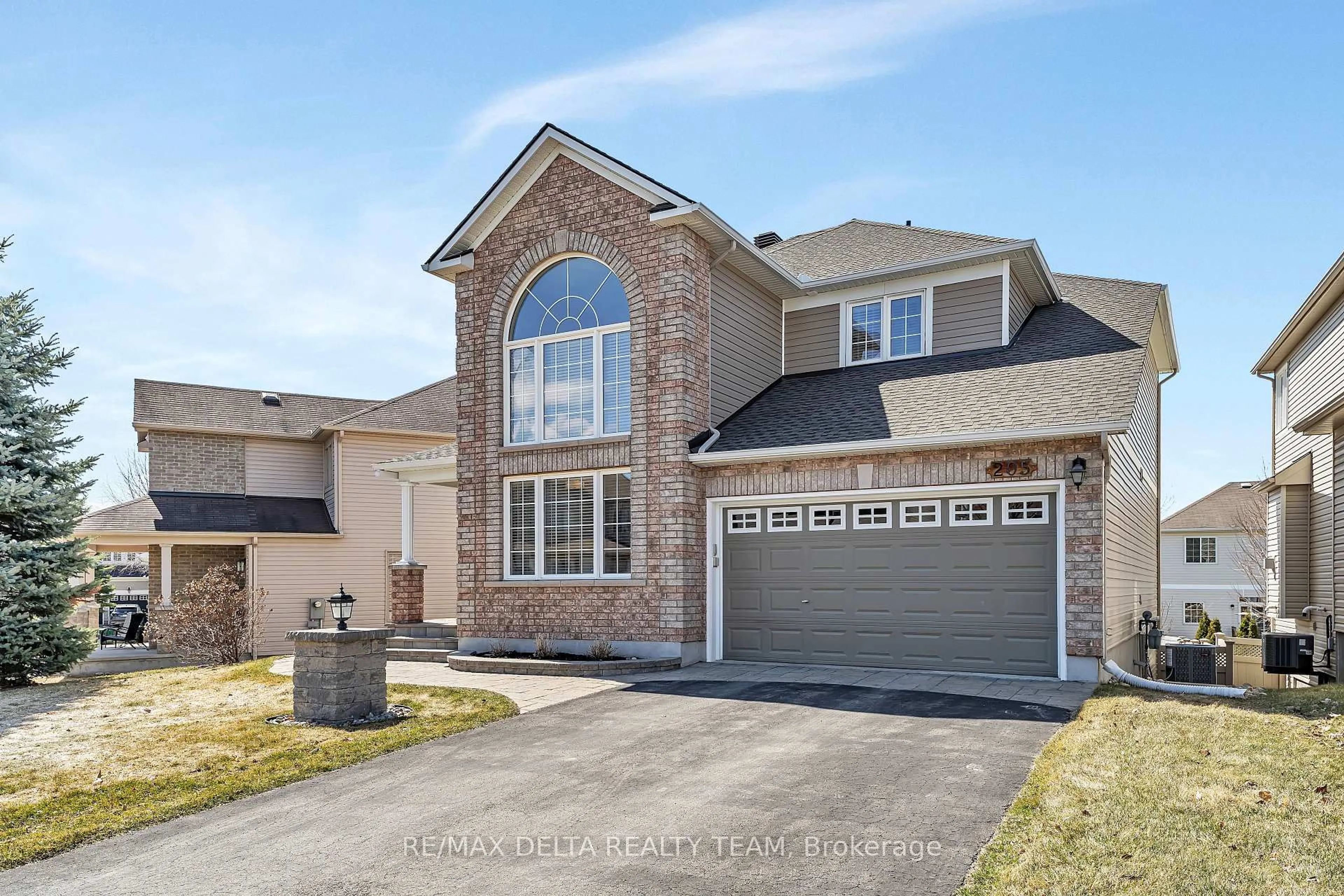 Home with brick exterior material, street for 205 Lucinda Cres, Ottawa Ontario K1W 0A1