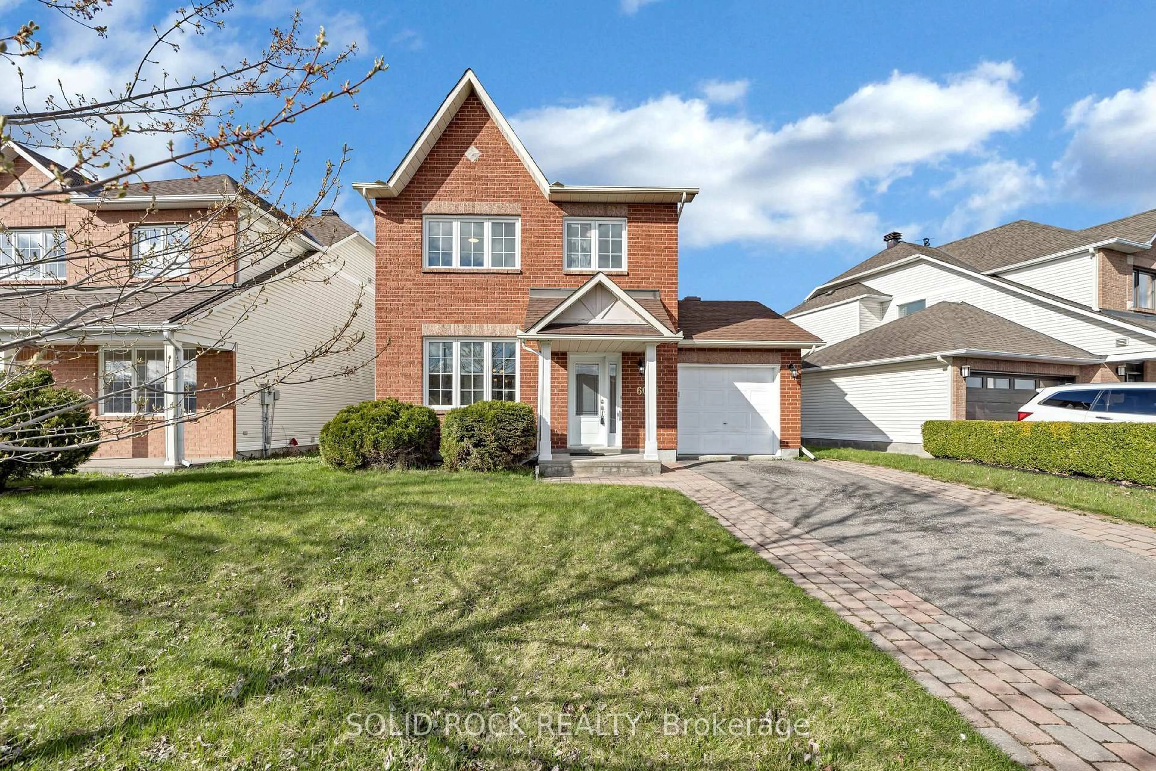 Home with brick exterior material, street for 6024 Longleaf Dr, Orleans Ontario K1W 1J2