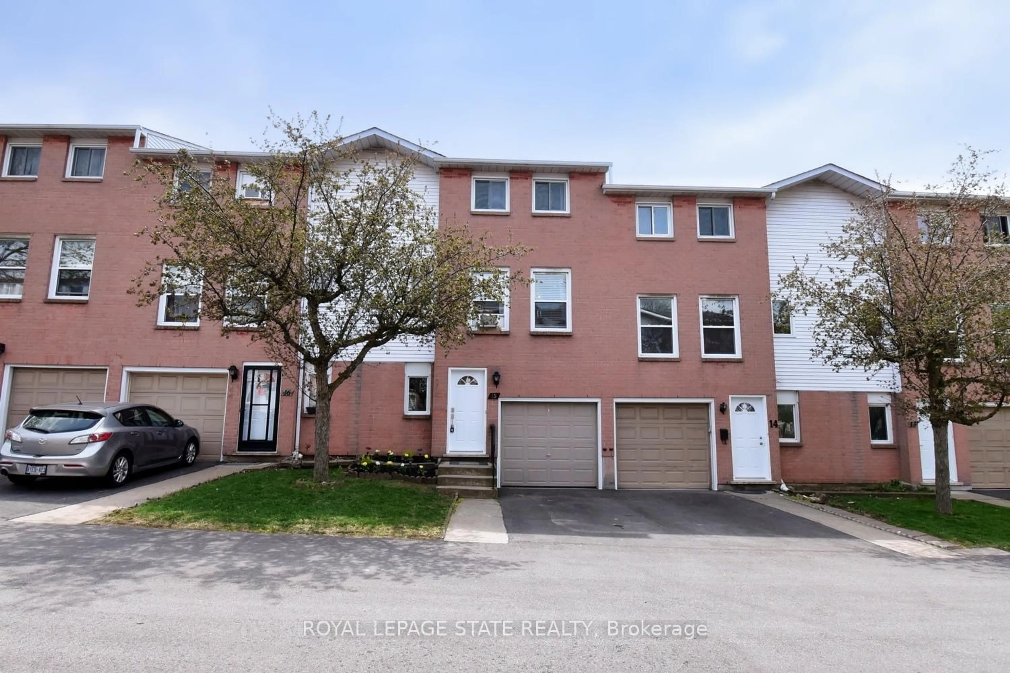 A pic from outside/outdoor area/front of a property/back of a property/a pic from drone, street for 1255 Upper Gage Ave #15, Hamilton Ontario L8W 3C7