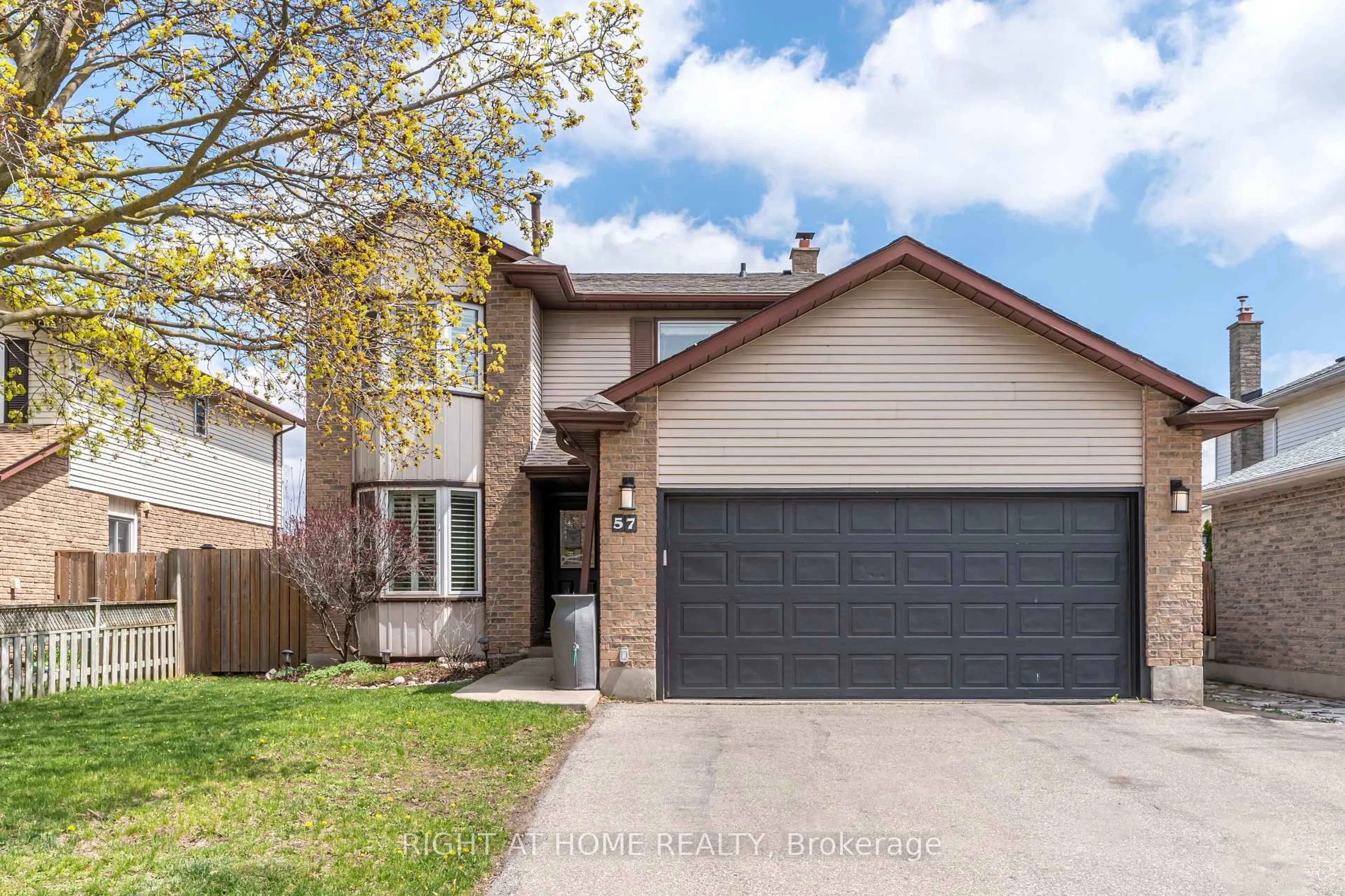 Home with vinyl exterior material, street for 57 Foxridge Dr, Cambridge Ontario N3C 3L8