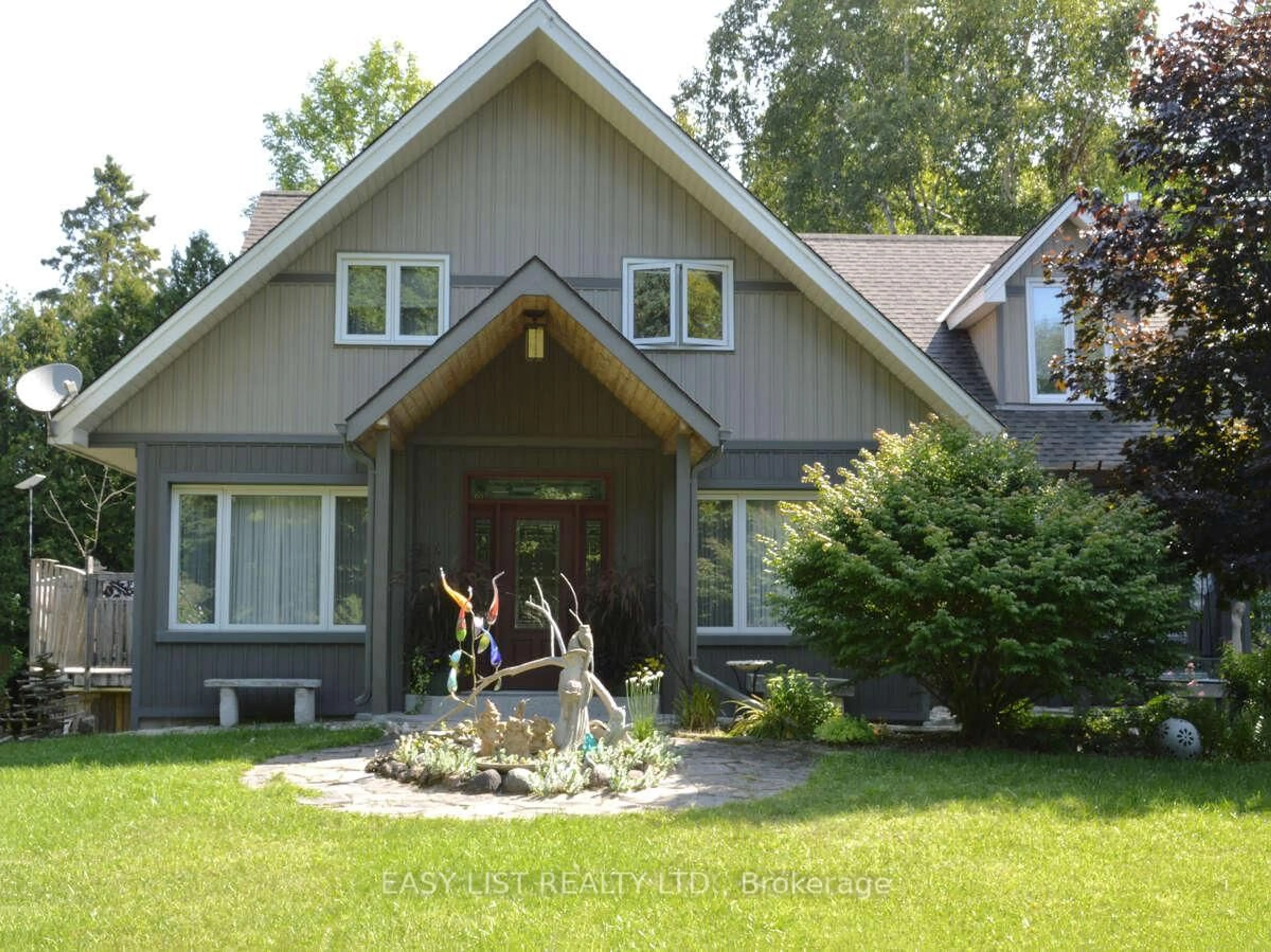 Home with vinyl exterior material, mountain view for 424 Huron Rd, South Bruce Peninsula Ontario N0H 2T0