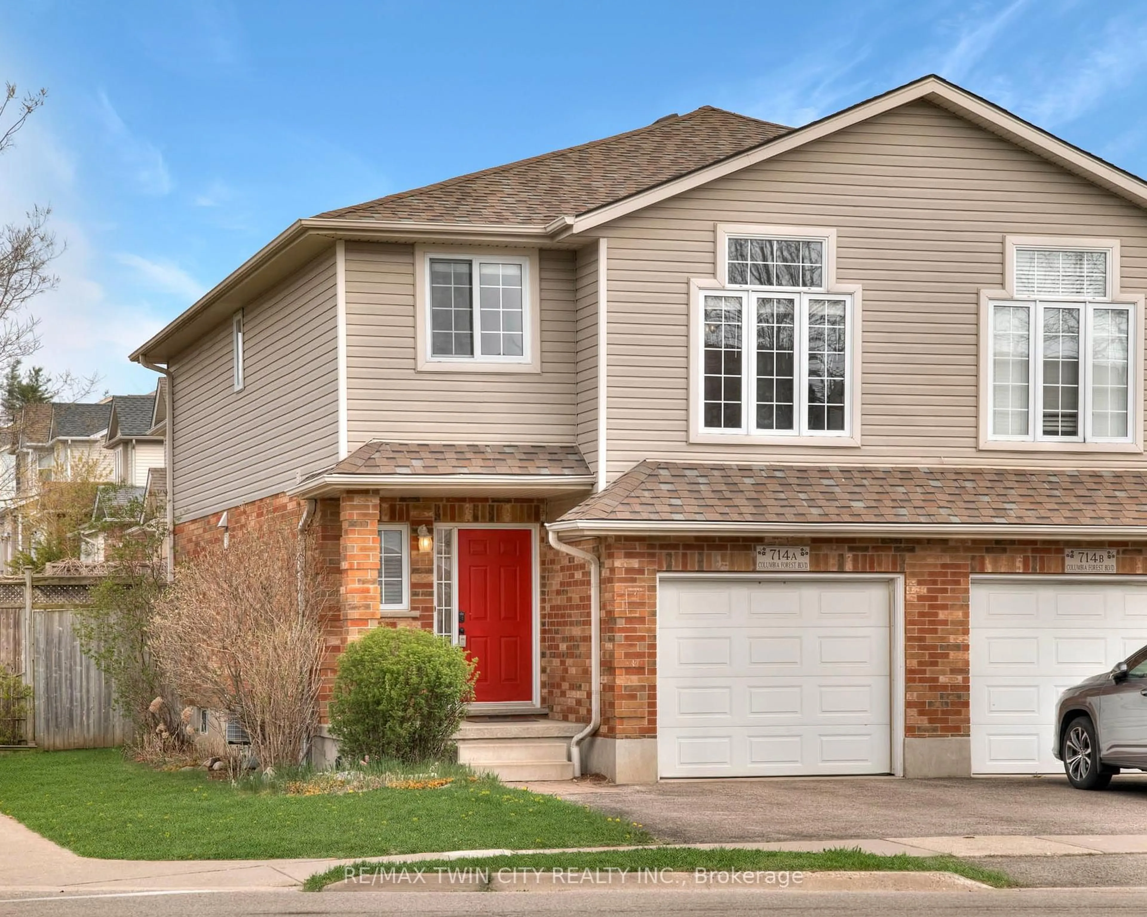Home with brick exterior material, street for 714A Columbia Forest Blvd, Waterloo Ontario N2V 2M4