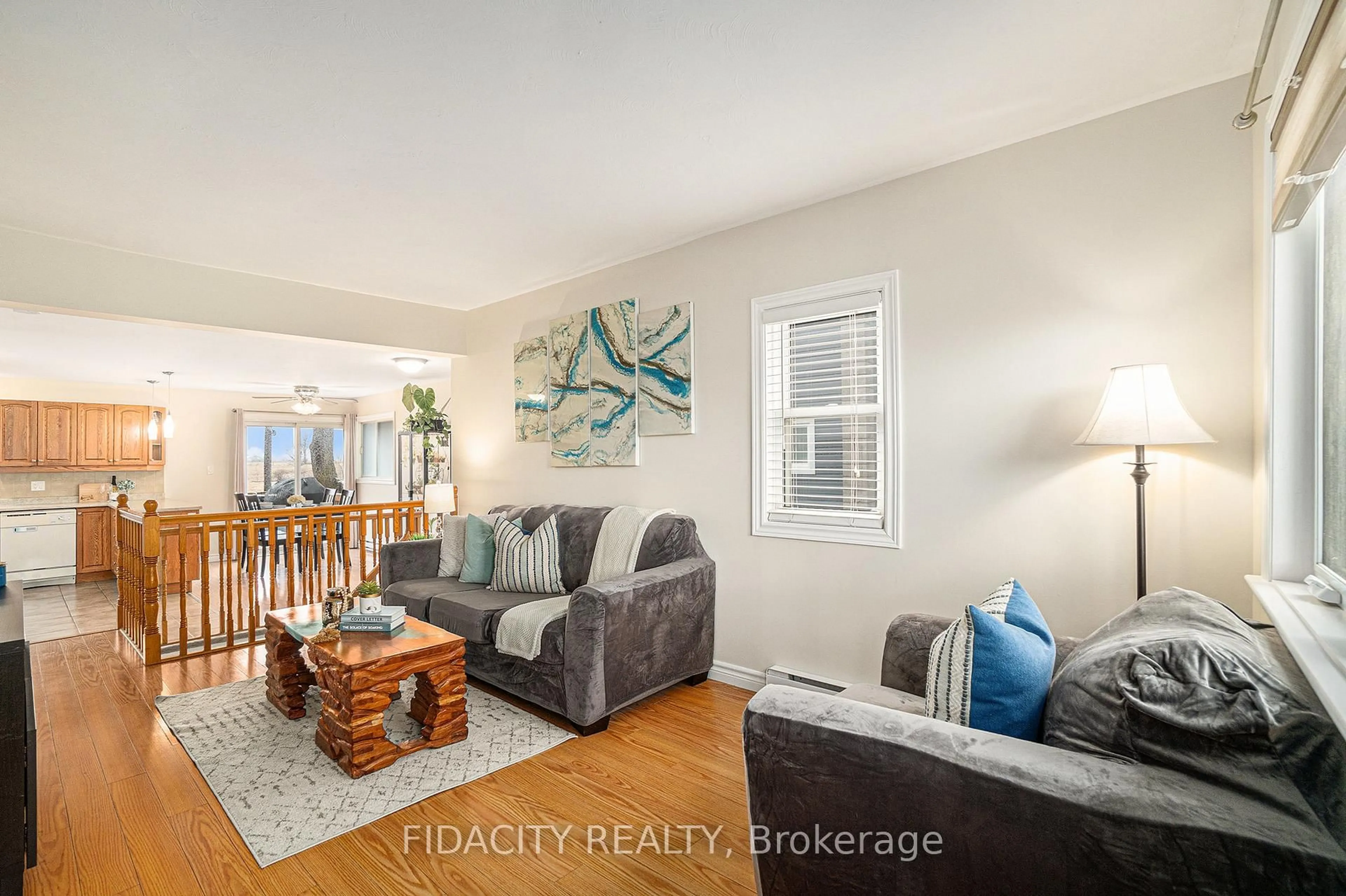 Living room with furniture, wood/laminate floor for 230 Main St, North Dundas Ontario K0C 1H0