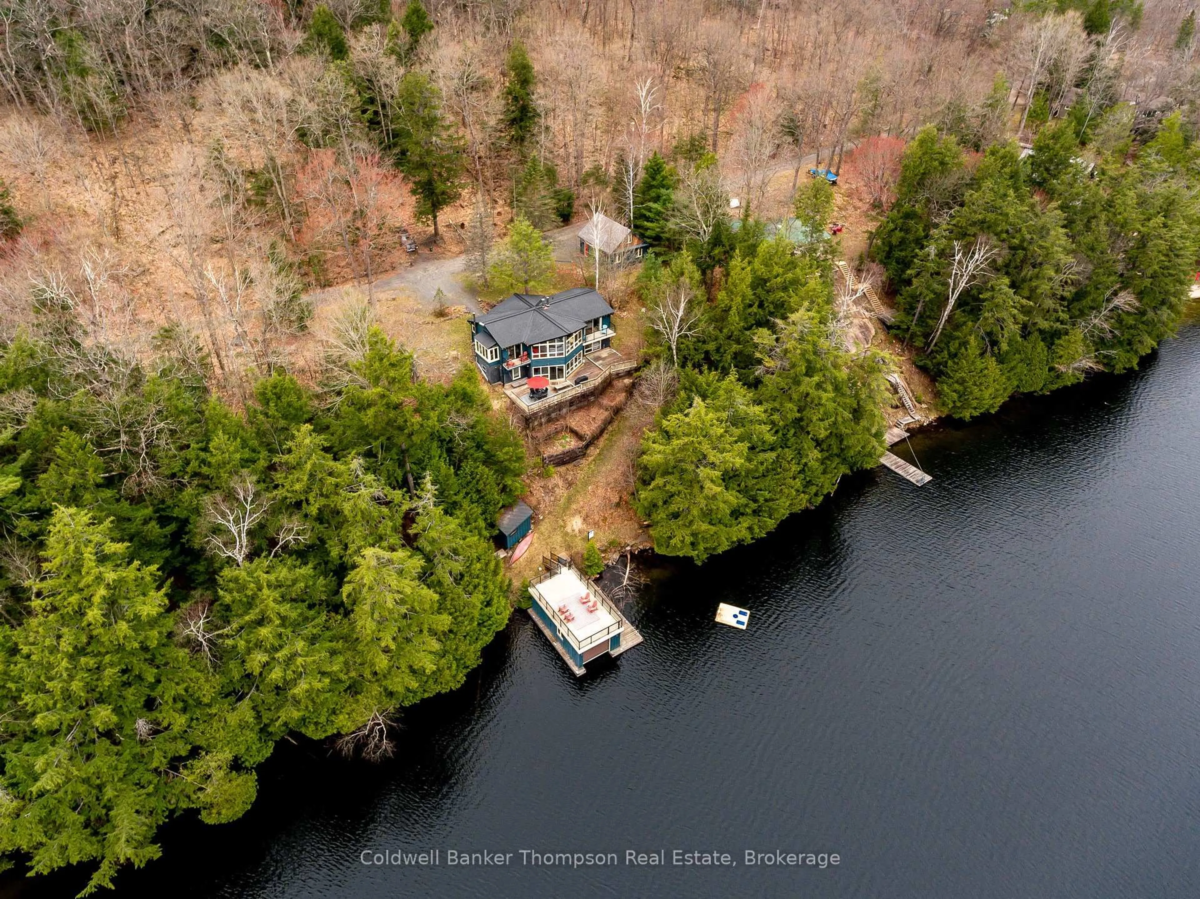 A pic from outside/outdoor area/front of a property/back of a property/a pic from drone, water/lake/river/ocean view for 1063 Lakeview Rd, Muskoka Lakes Ontario P0B 1M0