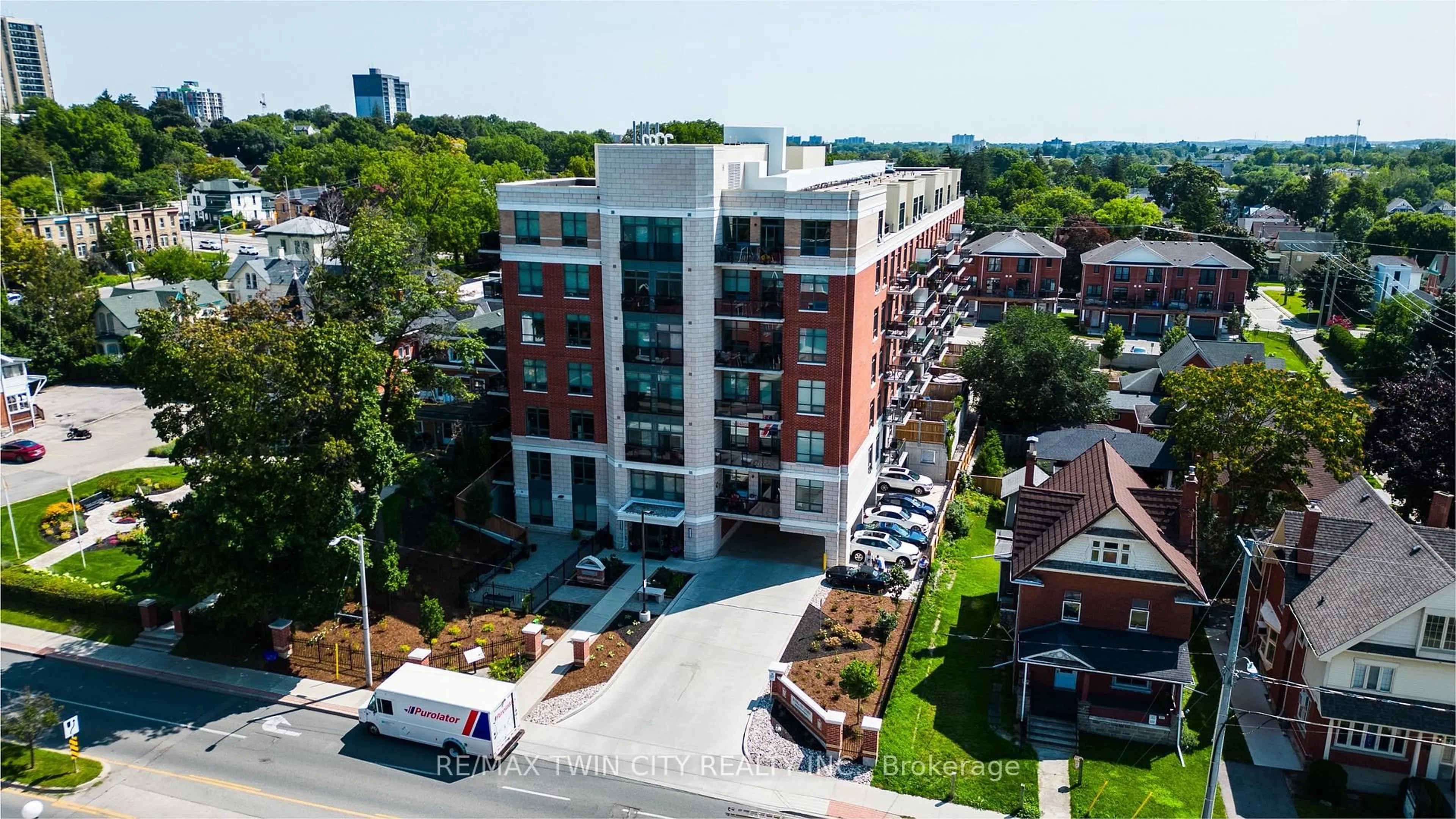 A pic from outside/outdoor area/front of a property/back of a property/a pic from drone, city buildings view from balcony for 399 Queen St #201, Kitchener Ontario N2G 0C4