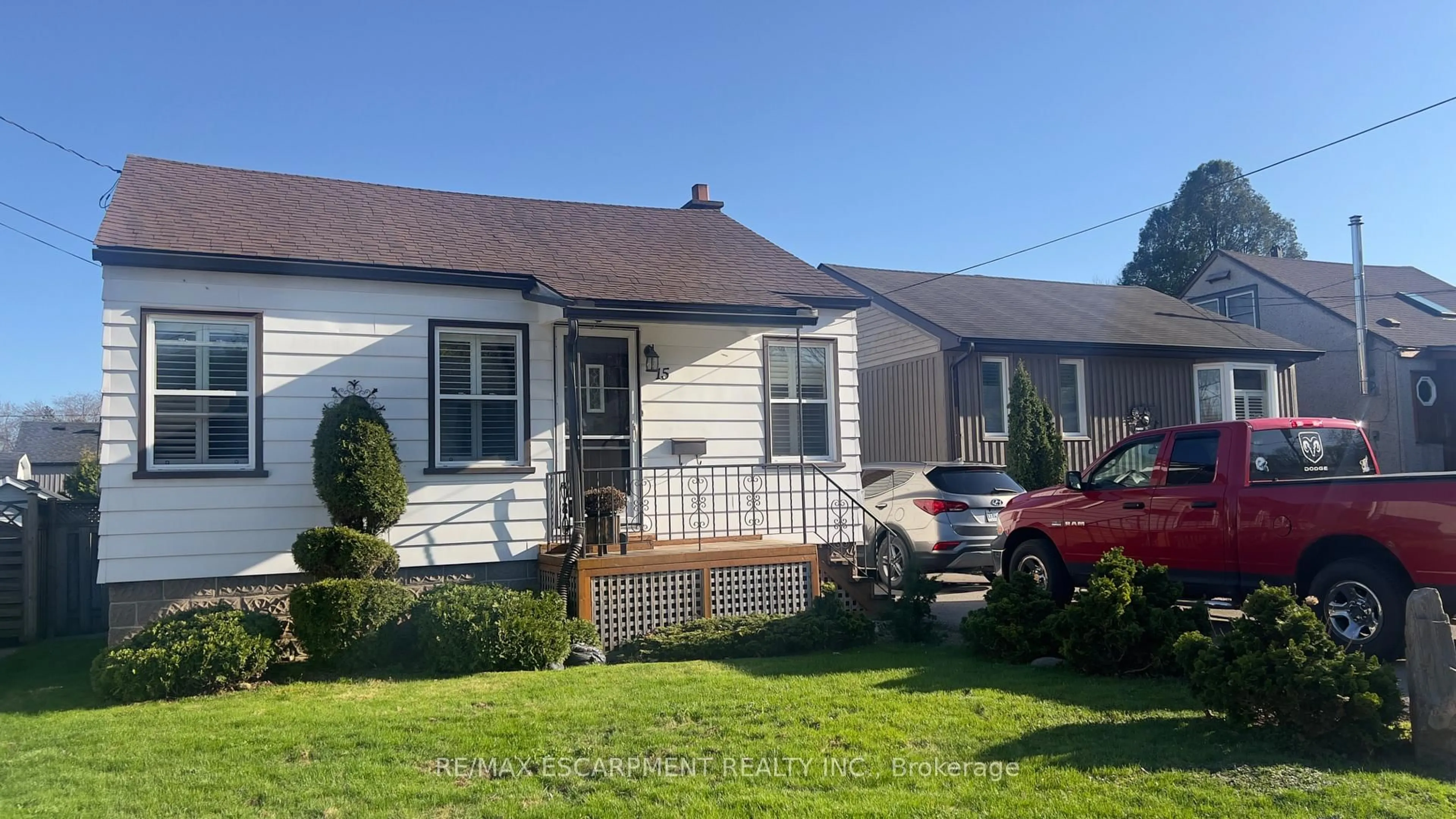 Home with vinyl exterior material, street for 15 Donald Ave, Hamilton Ontario L9H 1E9