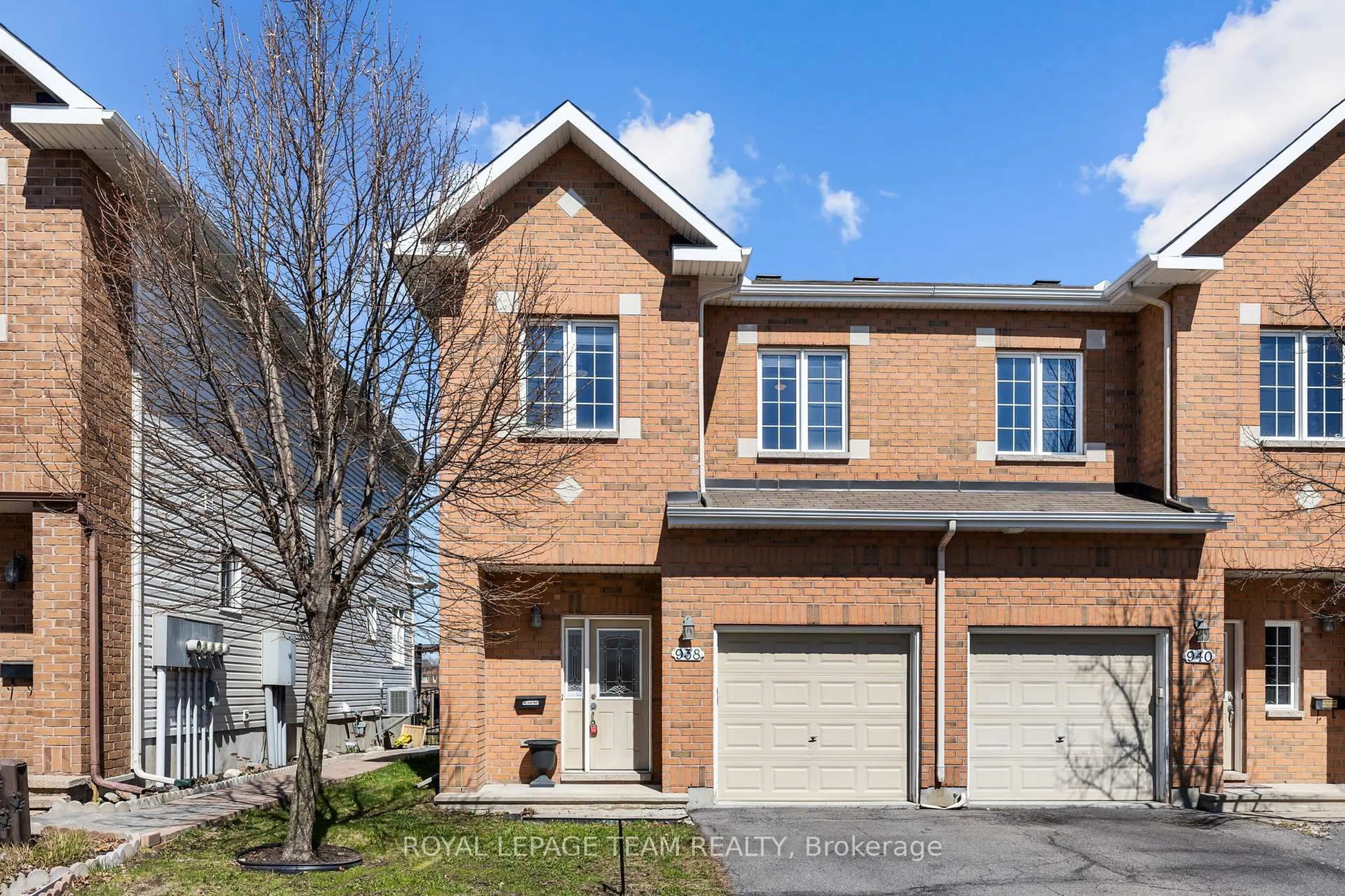 Home with brick exterior material, street for 938 Torovin Private Ave, Ottawa Ontario K1B 0A7