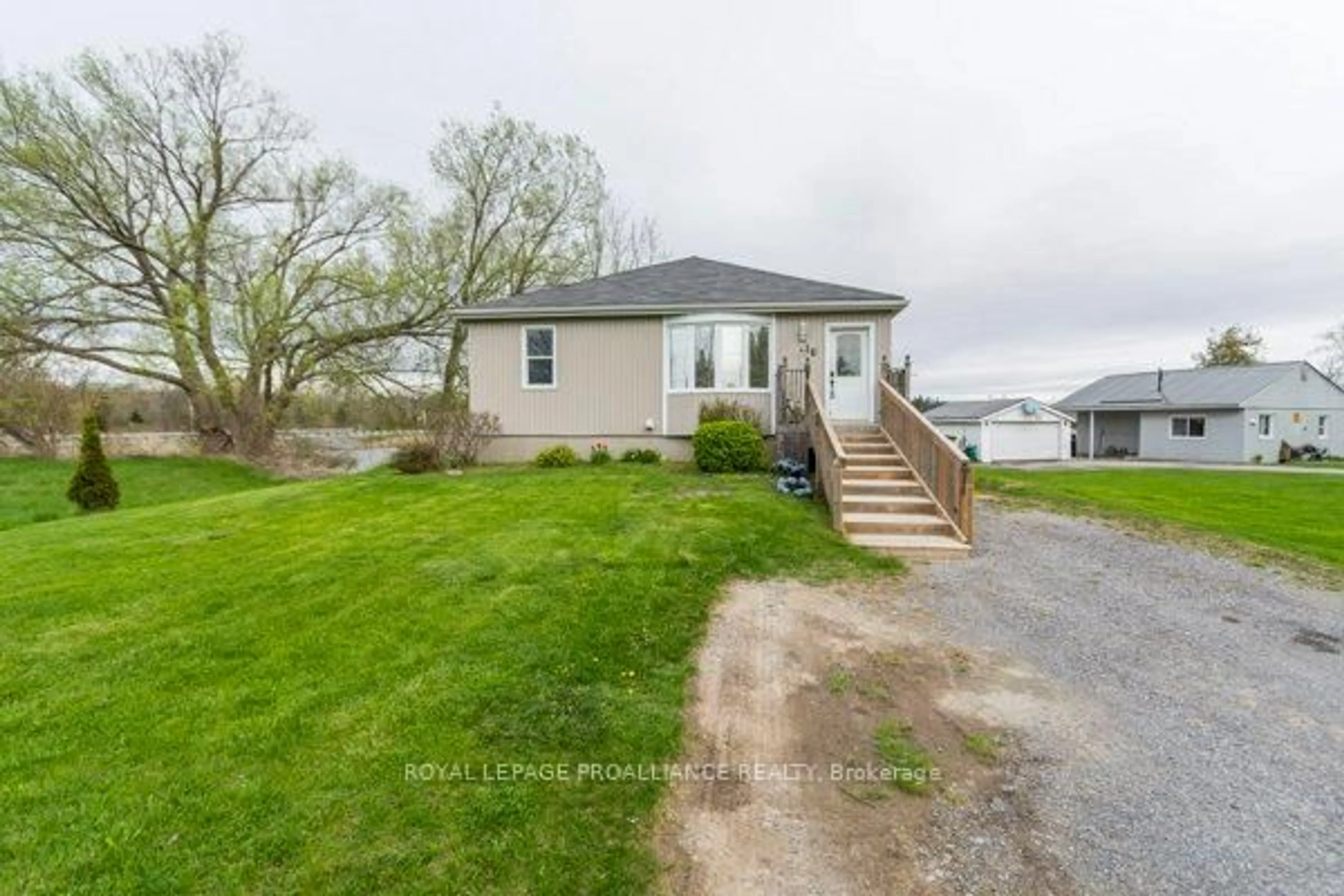 A pic from outside/outdoor area/front of a property/back of a property/a pic from drone, water/lake/river/ocean view for 16 Dead Creek Rd, Quinte West Ontario K0K 1L0