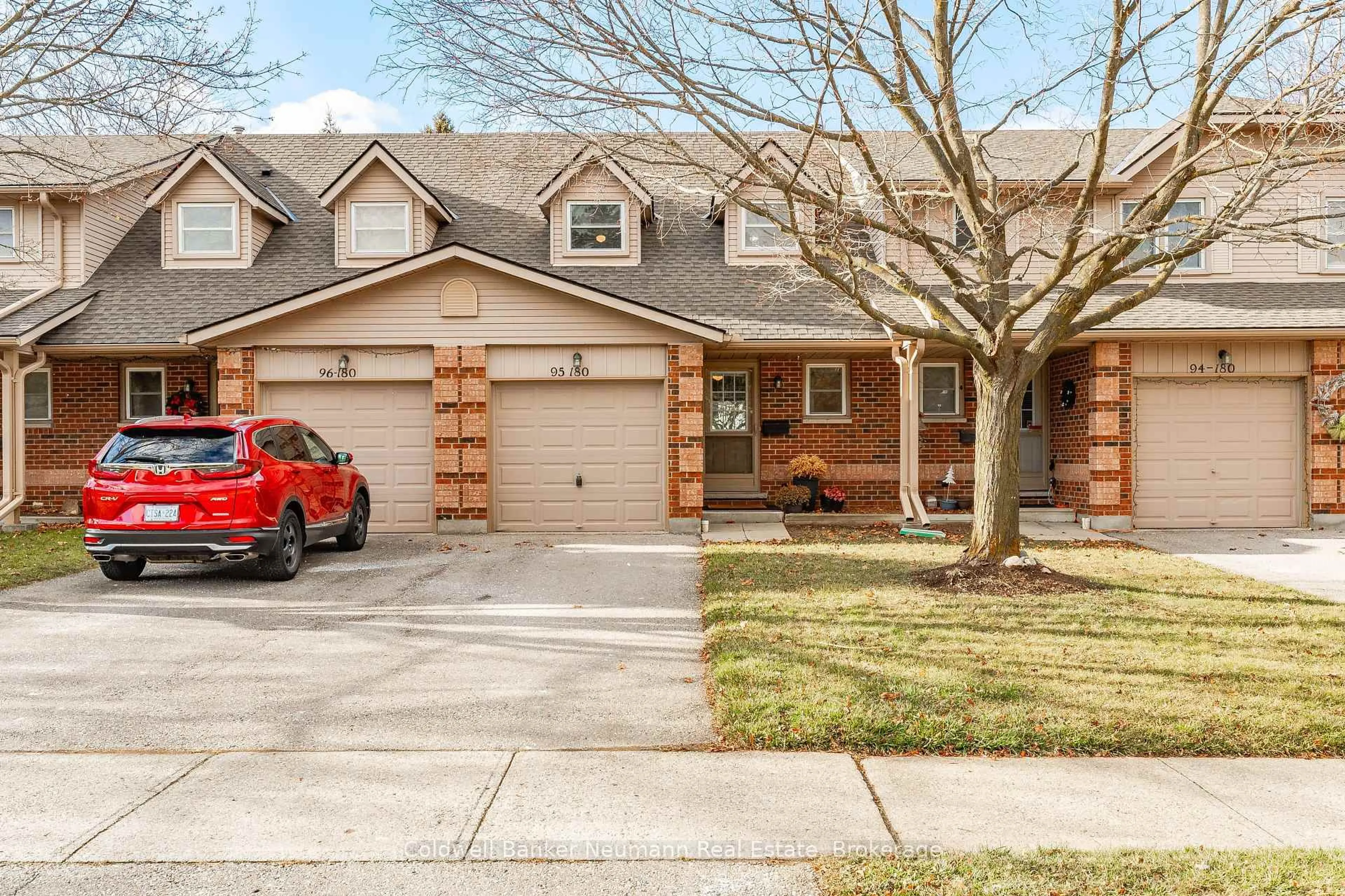Home with brick exterior material, street for 180 Marksam Rd #95, Guelph Ontario N1H 8G4
