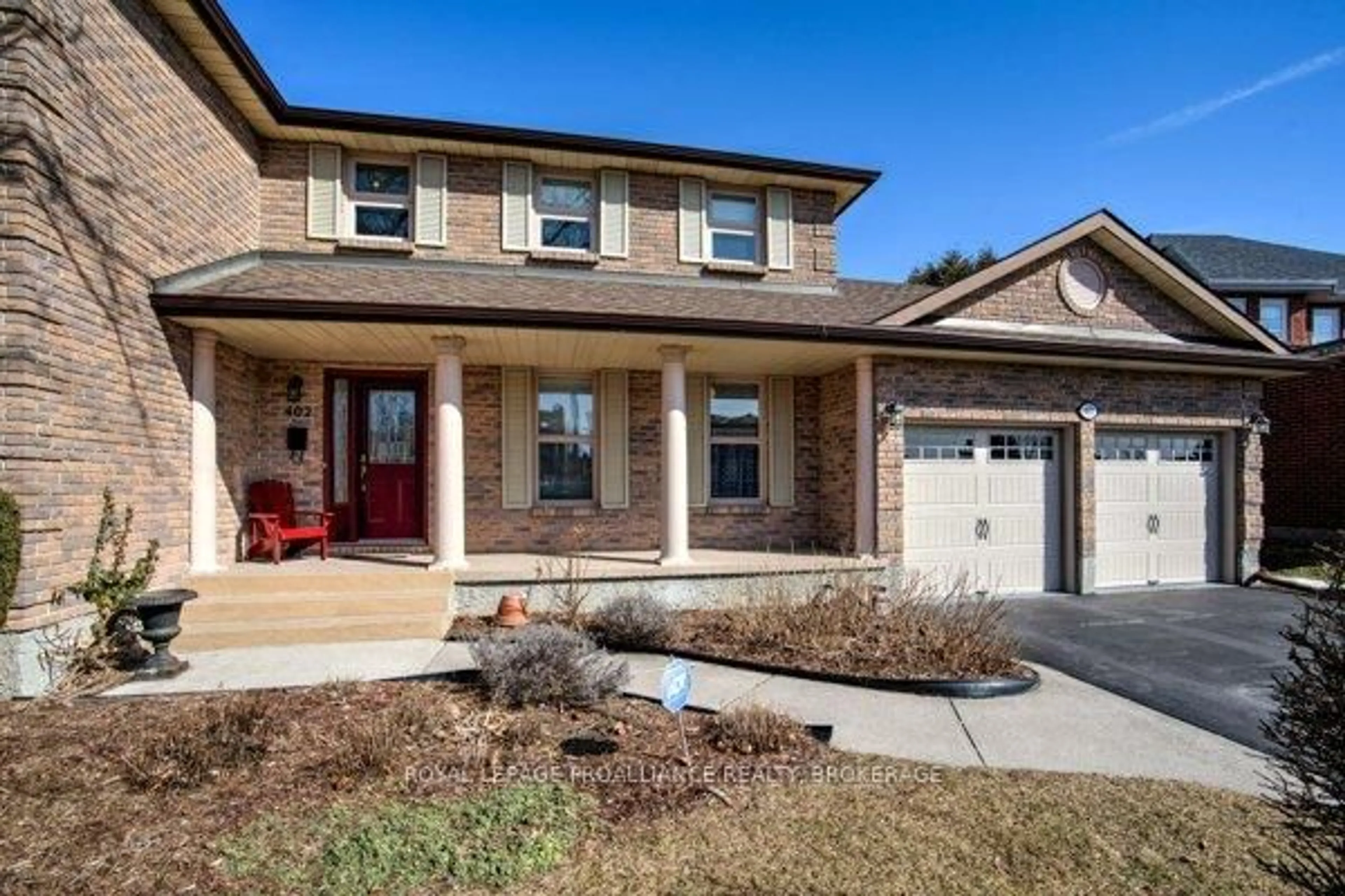 Home with brick exterior material, street for 402 Briarwood Dr, Kingston Ontario K7M 7V1