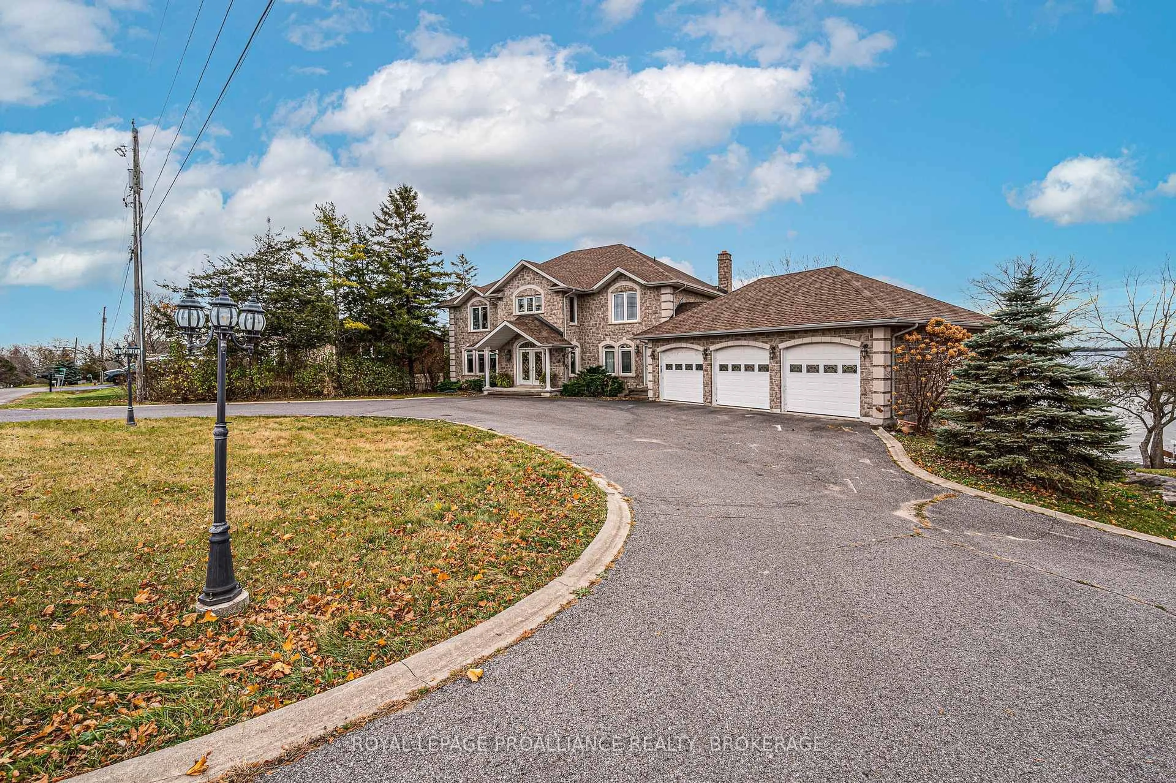 A pic from outside/outdoor area/front of a property/back of a property/a pic from drone, street for 4734 Lakeside Lane, Bath Ontario K0H 1G0