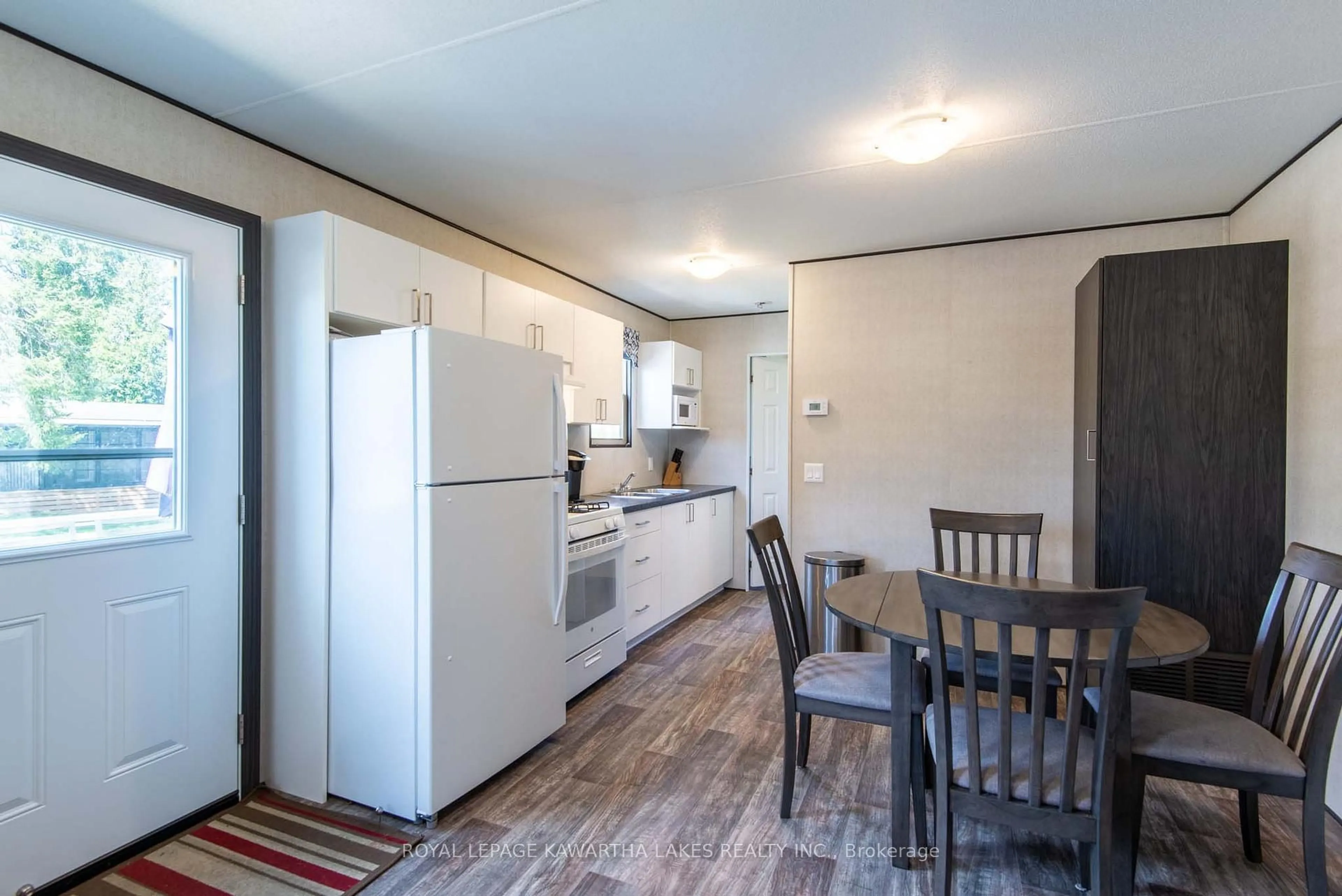 Standard kitchen, wood/laminate floor for 657 Thunder Bridge Rd #27, Kawartha Lakes Ontario K9V 4R1