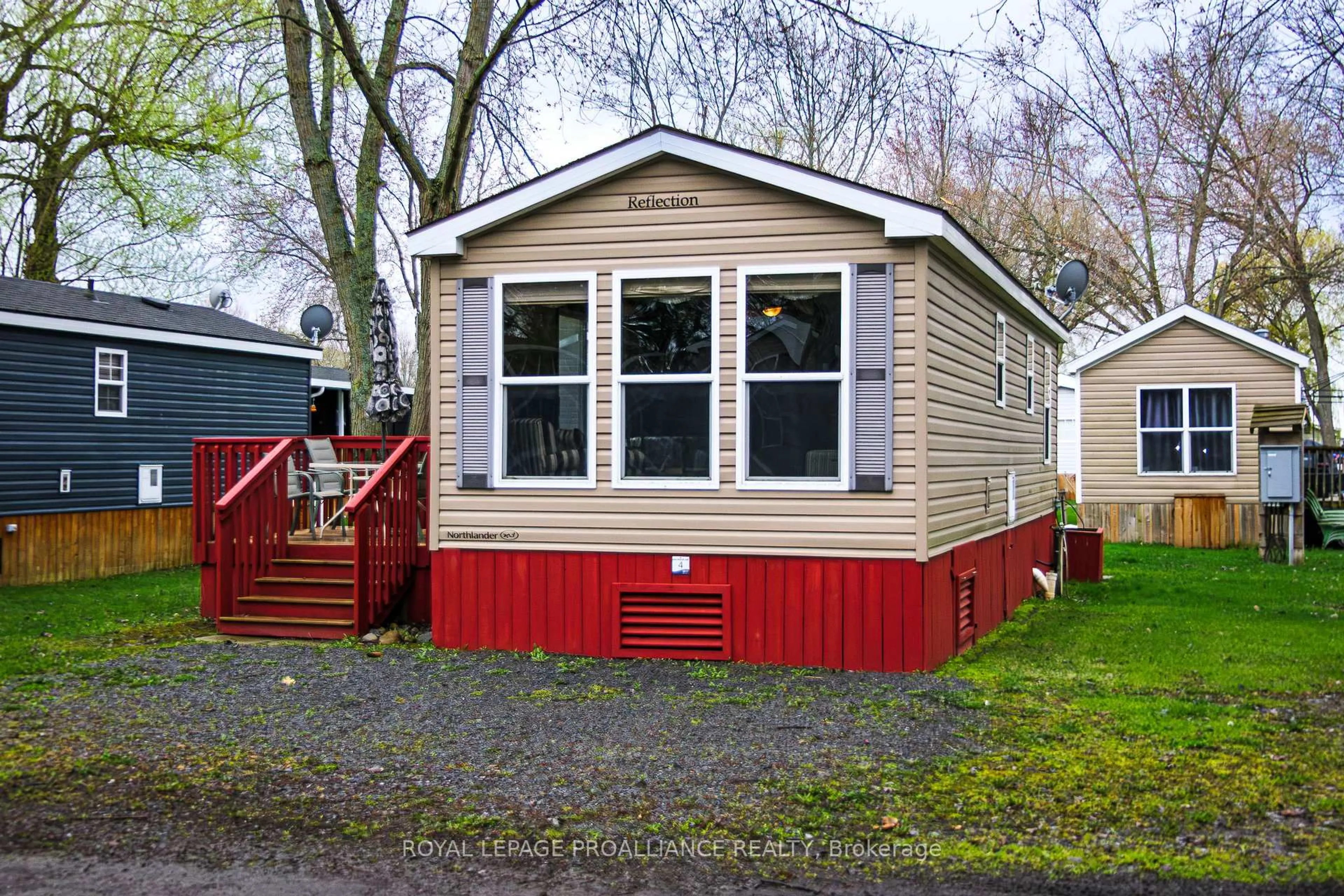 Home with vinyl exterior material, street for 486 County Rd 18 N/A #4 Park Meadow Lane, Prince Edward County Ontario K0K 1P0