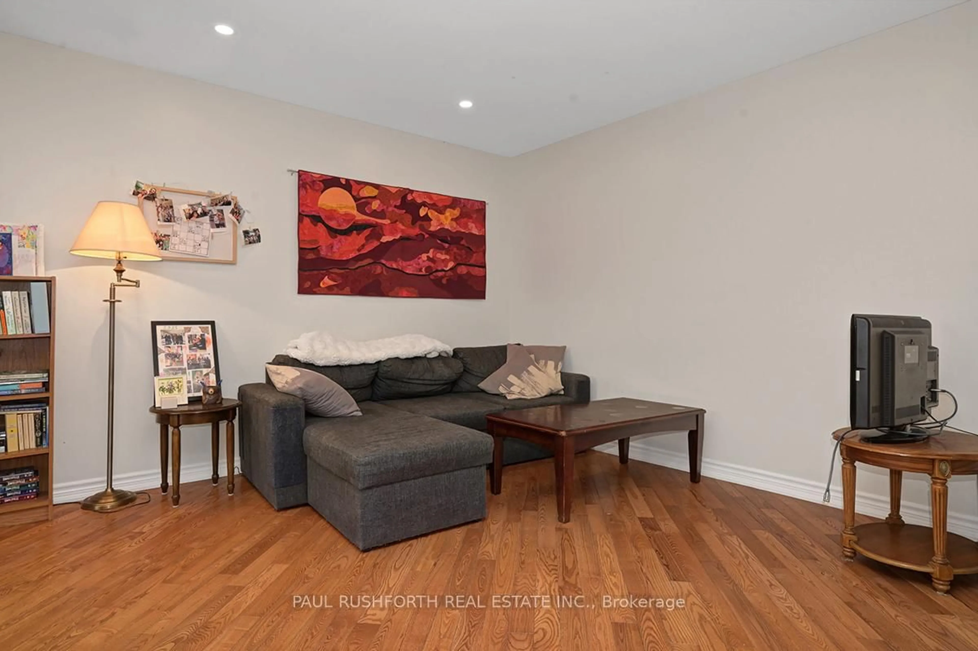 Living room with furniture, wood/laminate floor for 622 Shelley Ave, Ottawa Ontario K1G 0P4