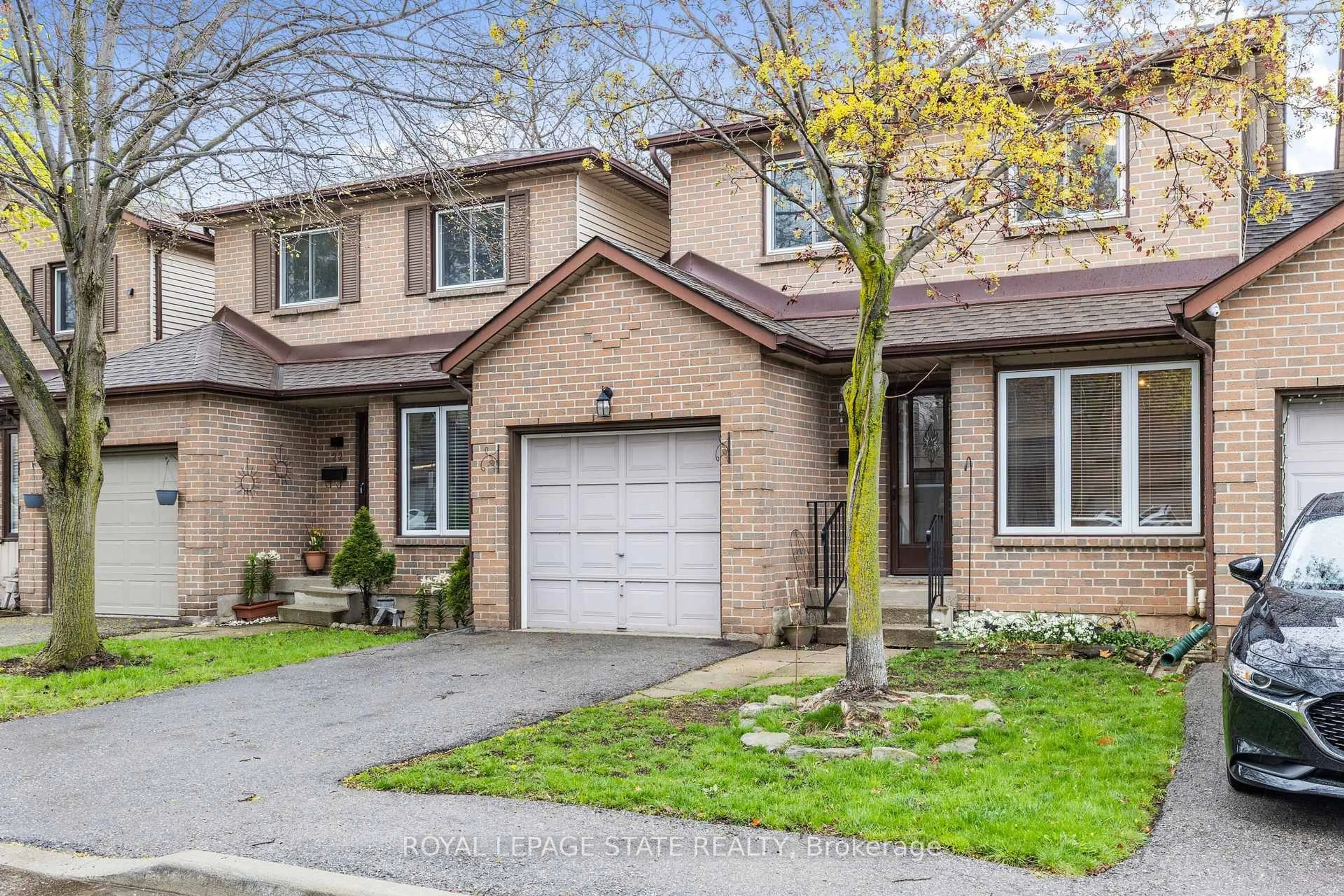 Home with brick exterior material, street for 618 Barton St #21, Hamilton Ontario L8E 4X3