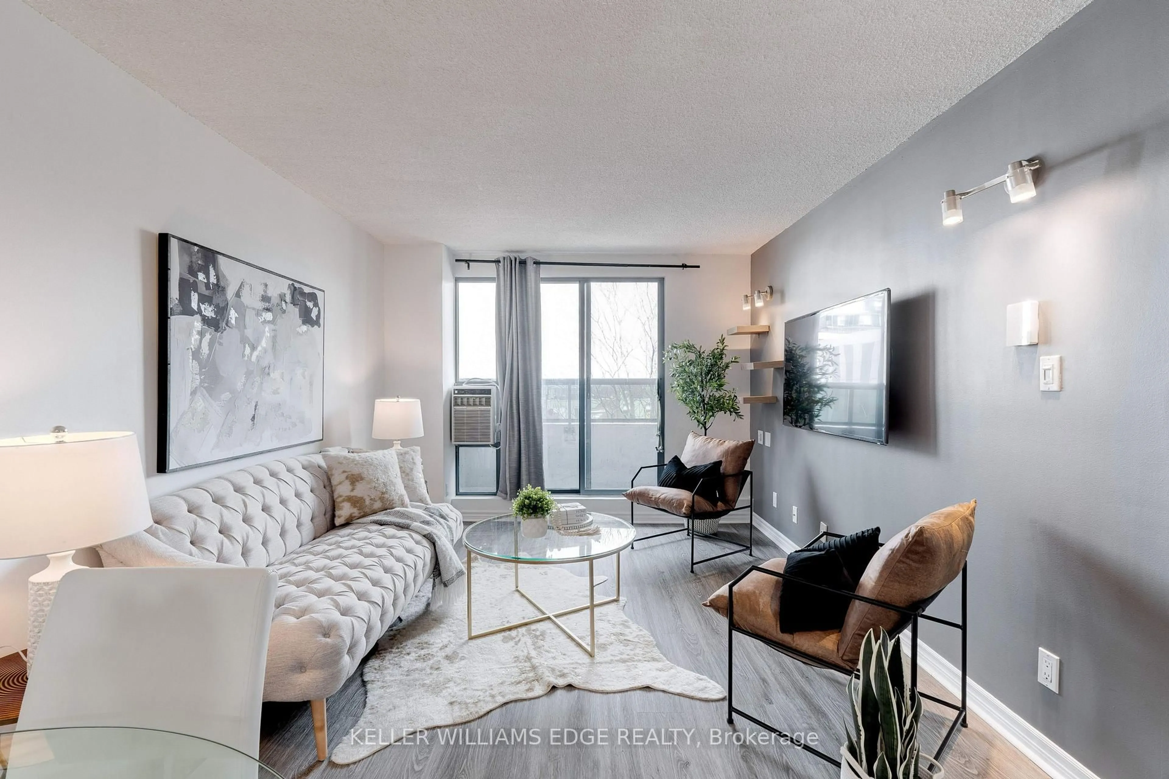 Living room with furniture, unknown for 175 Hunter St #409, Hamilton Ontario L8N 4E7
