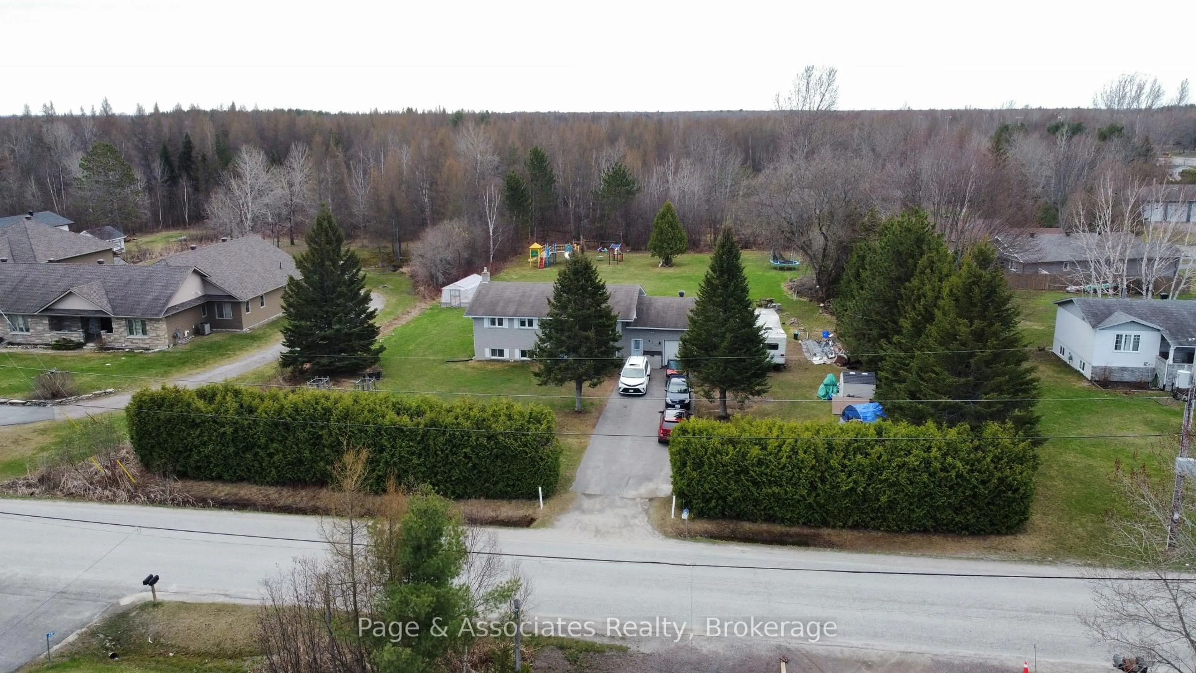 A pic from outside/outdoor area/front of a property/back of a property/a pic from drone, forest/trees view for 282 Salter St, West Nipissing Ontario P2B 2T6